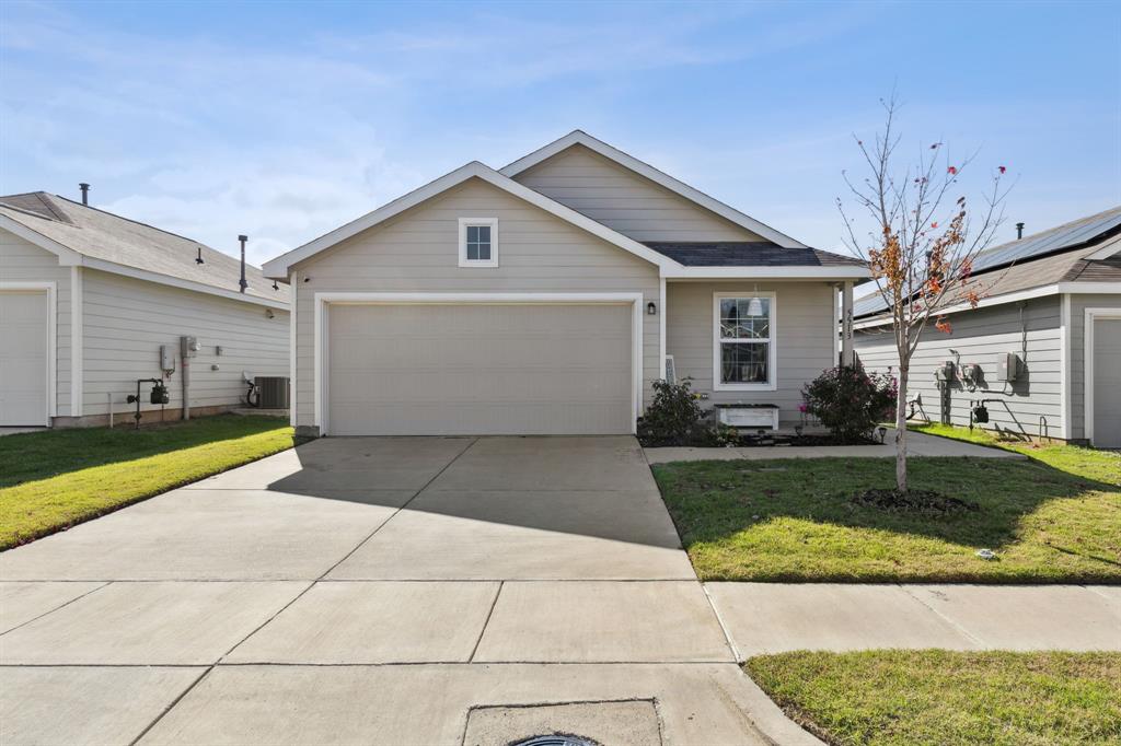 Looking for a cozy home that's close to everything you need? Look no further than this one owner charming 2-bed, 1-bath house with a 2-car garage. Nestled in a convenient location near highways & shopping centers, this home is perfect for those who want to be close to the action but still enjoy a quiet & peaceful neighborhood. Qualifying for zero-down USDA financing, this property is the perfect match for first-time homebuyers or an excellent addition to an investor's portfolio. Inside you are greeted by a warm & inviting living area that's perfect for relaxing & spending time with family & friends. The kitchen is bright & airy, featuring all the essentials you need to whip up your favorite meals & snacks. The bedrooms are spacious & comfortable, providing a peaceful retreat at the end of a long day. The 2-car garage provides ample space for your vehicles and storage. The large backyard features a wood privacy fence and full sprinkler system. The Trinity Crossing neighborhood offers a pool, playground & large open play area. Search address on YouTube for videos.