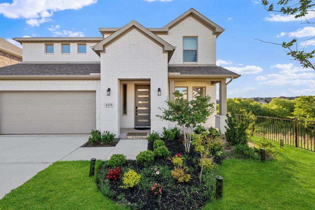 Set on a rare elevated corner lot backing to the creek, this home delivers two-sided water views and an orange-sky sunset over the backyard every evening, something new construction can't replicate. Inside, soaring ceilings open up the main living area, anchored by a fireplace. The kitchen centers on a striking quartz island with upgraded appliances, flowing into a dining space wrapped in windows that frame the treetops. A main-floor study works well as a home office, with a separate game room upstairs. Engineered hardwood runs throughout, with upgraded carpet in the bedrooms, and the extended tiled patio is where you'll want to be at sunset. Barely a year old and move-in ready, it offers the upside of a new build without the wait or the add-on costs. Over $116K in upgrades, composite iron fencing, and an EV charger round it out. Zoned to top-rated Prosper ISD, with a new elementary school opening within walking distance in August 2027.