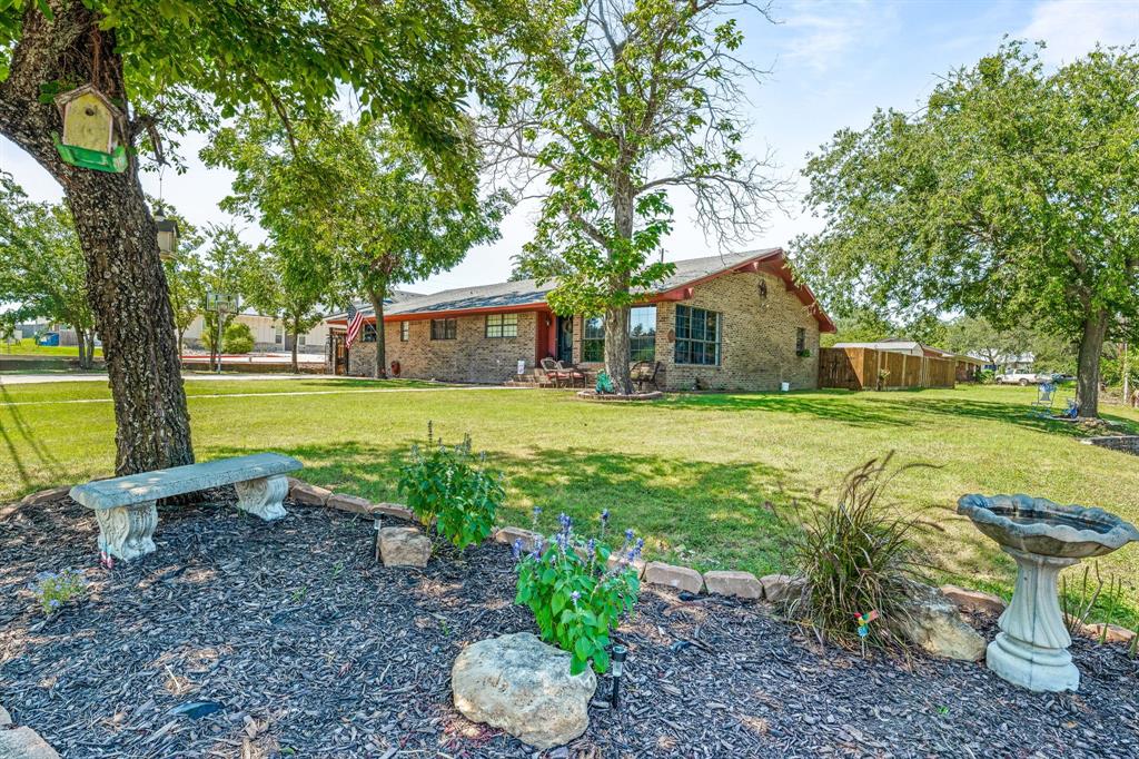 Live Smart. Invest Confidently. Thrive Here.

Welcome to 810 Alexander Street in Stephenville, a versatile, well-located home just minutes from Tarleton State University—only a 15-minute walk or 4-minute drive to campus. Whether you’re searching for a forever home, a flexible family layout, or a strong investment in a high-demand rental area, this property delivers on every level.
With four spacious bedrooms plus a bonus living area featuring a walk-in closet, this home offers the rare flexibility to adapt to your needs. Easily convert the bonus space into a fifth bedroom, private home office, media room, or even an additional primary suite—the layout truly grows with you.
At the heart of the home, the kitchen shines with warm cherrywood cabinetry, granite countertops, a central island, and abundant storage—perfect for entertaining, everyday living, or busy student schedules. The open-concept living and dining areas create a seamless flow, enhanced by decorative lighting and modern fixtures that add comfort and style.
Enjoy the convenience of two oversized bathrooms, generous walk-in closets, utility storage, and an outdoor storage shed—everything has its place here. The thoughtful design balances comfort, function, and long-term value.
Located near restaurants, shopping, and campus life, this home is equally appealing as a primary residence or a smart income-producing rental. Homes with this level of space, flexibility, and proximity to Tarleton are always in demand.
Opportunity meets potential at 810 Alexander Street.
Schedule your private showing today and see why this property is a standout in Stephenville’s market.