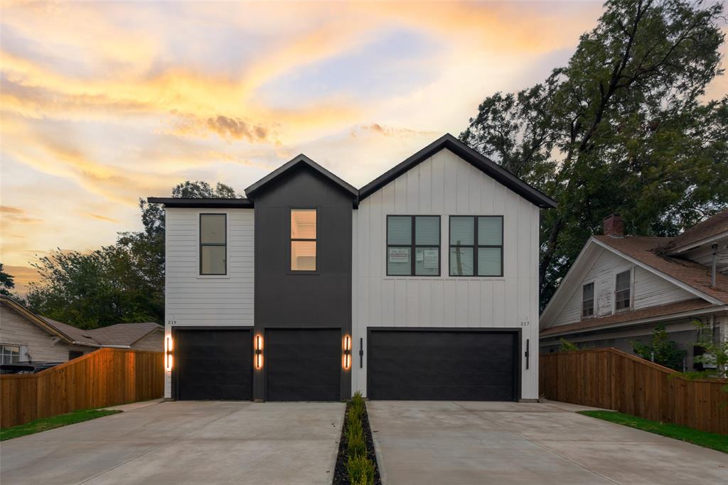 Brand-new construction duplex in the heart of Dallas! Welcome to 217 W Yarmouth St, a stunning two-story 3-bedroom, 2.5-bath home that combines modern design, quality craftsmanship, and comfort in every detail. Step inside to an open-concept floor plan highlighted by beautiful hardwood floors, abundant natural light, and a cozy fireplace that anchors the spacious living area. The gourmet kitchen boasts granite countertops, custom cabinetry, stainless steel appliances, and a spacious island, ideal for entertaining or casual family meals. Upstairs, the primary suite provides a serene retreat, complete with a walk-in closet and a spa-like bath featuring dual vanities and elegant finishes. Two additional bedrooms and a full bath provide flexibility for guests, a home office, or a growing family. Enjoy the convenience of new construction, energy-efficient materials, and a low-maintenance lifestyle. This home is just minutes from Downtown Dallas, Bishop Arts District, the new Halperin Park, schools, shopping, dining, and major Dallas attractions. Experience the perfect balance of style, comfort, and location—schedule your showing today! The other side of this new construction duplex at 219 W Yarmouth St is also available for sale & rent - same builder, modern design, and finishes. *Please note photos are of the neighboring duplex 219 W Yarmouth.