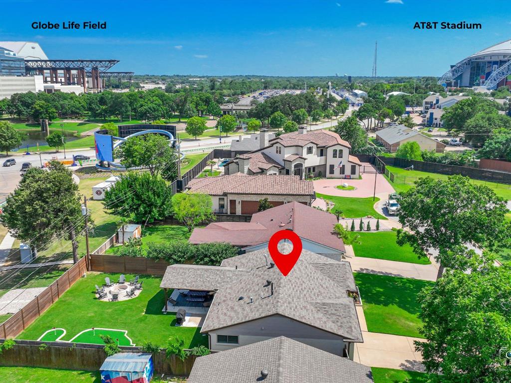 Rare opportunity to own an established short-term rental property in one of the hottest short-term rental markets of DFW – the Arlington Entertainment District!  Walk-out the back gate and within a short walk you can be at AT&T Stadium, Globe Life Field, Choctaw Stadium or Six Flags over Texas enjoying any of the year-round events that are offered.  Designed with both comfort and functionality in mind, this spacious home features 3 bedrooms and 2 full bathrooms. Completely remodeled 2 years ago, the home showcases gorgeous wainscoting throughout the living and dining areas, luxury vinyl plank flooring throughout, a stunning updated kitchen and stainless appliances including electric cooktop (plumbed for gas as well) with a designer vented hood, and beautifully renovated bathrooms.  Step outside to the backyard where you’ll find a large (257sf) covered patio, a fun putting green, and a large fire pit for evening gatherings.   Mechanical updates: tankless water heater, HVAC system plus insulation, full yard irrigation system, and roof.  Additional interior improvements and updates include flooring, lighting fixtures, plumbing fixtures, designer ceiling and wall treatments, interior and exterior doors, and all windows.  Furnishings included!  If you’re looking for a great turnkey investment property to start earning a return today, look no further than this one!
