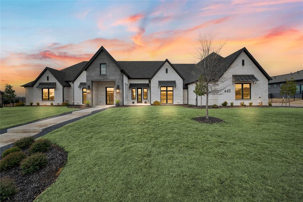 Elegance meets a modern touch in Mustang Lakes! Discover this exquisite Dave R Williams custom-built home in Celina's prestigious master-planned community. Boasting 4 bedrooms, 6 baths, and an oversized 4-car garage, this property defines luxury. Step inside to find a large, open floor plan filled with an abundance of natural light, anchored by a full-sized wet bar complete with a wine fridge and ice maker. The spacious kitchen flows seamlessly into multiple living spaces, ideal for entertaining. The primary suite is a haven - featuring a coffee bar, an exercise room, a lavish closet with an island and a convenient washer dryer hookup, and a bathroom oasis for you to relax in. Each bedroom offers an ensuite bath and walk-in closet. The home's exterior is equally impressive, with a massive outdoor covered patio and over an acre of lush yard space. Storage enthusiasts will enjoy just over 1,100 square feet of Texas basement storage above the garage. Residents have access to top notch community amenities including 2 pools, a clubhouse with a full size gym, lakes, fishing, 18 miles of walking trails, sport courts, playgrounds, a fire pit, and plenty of community events. Front yard maintenance is included in your HOA fees. Conveniently located near shopping and zoned for the highly sought after Prosper ISD, this home is the sweet spot of luxury living in Celina!
