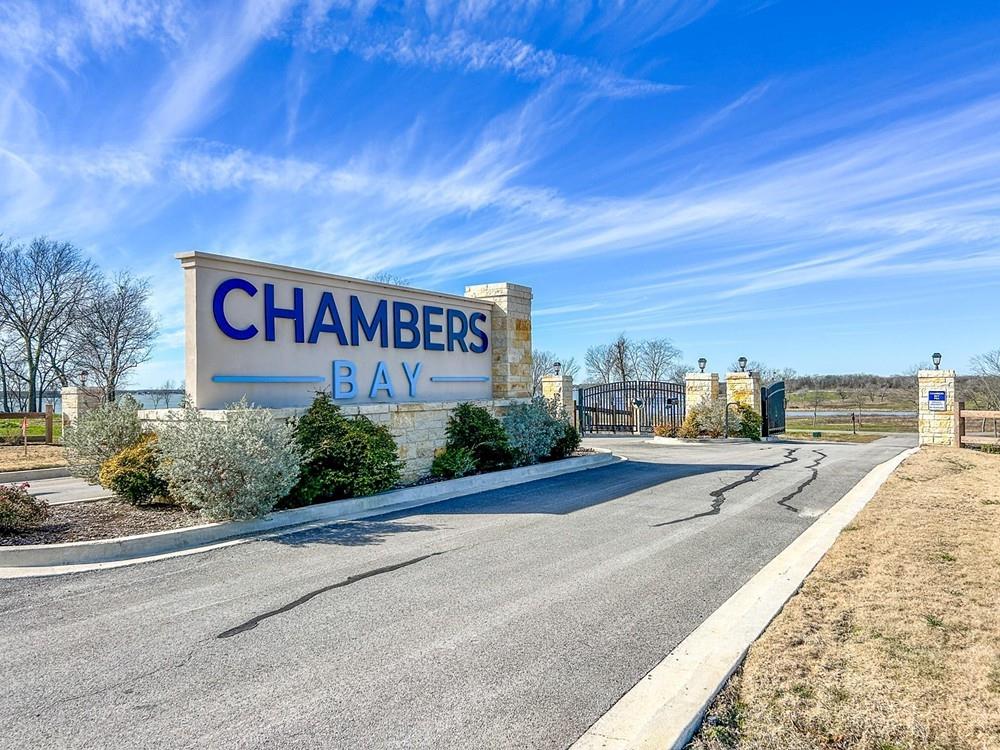 Escape the city hustle and find your peace at Chambers Bay! Located on the quiet northern branch of Richland Chambers Lake in Kerens, this upscale community offers the perfect blend of luxury and tranquility—all just a quick hour’s drive (approx. 50 miles) from downtown Dallas.

Imagine building your dream retreat on one of these sprawling, flat lots. Enjoy building your beautiful home on this 3+ acre lake access property, where you’ll have plenty of room to breathe. These lots are spacious and offer sweeping views that never get old. To keep the neighborhood looking sharp and high-end, the community is gated and restricted to site-built homes with a minimum of 1,600 sq ft.

The lifestyle here is all about that lakeside oasis vibe. You’ll have full access to top-notch amenities, including a beautiful community pool, a clubhouse for gatherings, and a private dock for easy days on the water. Whether you’re into fishing, boating, or just watching the sunset over the lake, Chambers Bay is the spot.

Don't miss the chance to grab your slice of Navarro County paradise. Come out, walk the land, and start planning your custom build today!