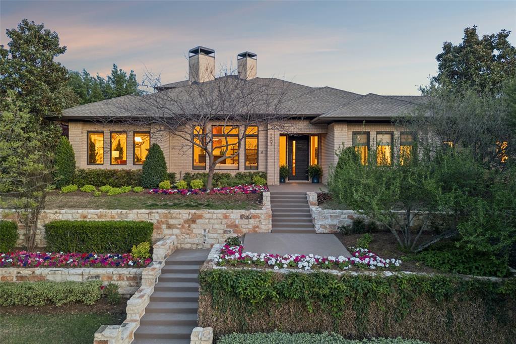 This stunning soft contemporary residence sits on an elevated oversized lot offering the perfect blend of luxury, comfort, and functionality. Designed with an open-concept floorplan, the home seamlessly connects spacious living areas creating an ideal flow for both everyday living and entertaining. With a home office conveniently located near the primary bedroom, the workspace offers a perfect area complete with windows overlooking the stunning pool and abundant built-ins to provide you with a comfortable and highly functional space. The home includes a thoughtful mix of formal and casual entertaining spaces giving everyone space to pursue their interests and hobbies. Featuring generously sized bedrooms and 6 beautifully appointed bathrooms, the home provides ample space for family and guests alike. 
Step outside to discover two separate outdoor living areas designed for year-round enjoyment. The covered patio overlooks a resort-style backyard complete with a sparkling infinity edge pool, relaxing hot tub, and inviting fire pit—perfect for entertaining or unwinding under the stars. While the other side of the home provides a beautiful patio for morning coffee or afternoon al fresca dining.
With its expansive lot, versatile layout, and exceptional indoor-outdoor living, this home offers a rare opportunity to enjoy luxury living at its finest in the prestigious guarded and gated Starwood Community.