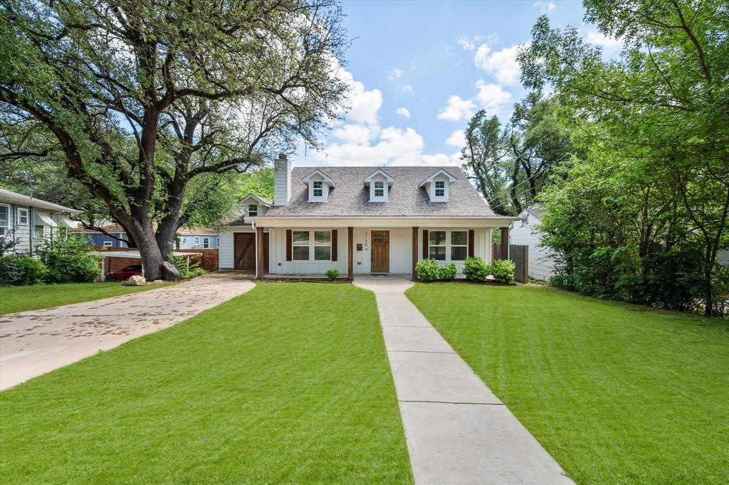 Welcome to this beautiful home in the highly desirable Oakhurst neighborhood of Fort Worth, where modern design meets timeless character.
Step inside to a bright, open-concept layout featuring expansive living and dining spaces, perfect for entertaining or everyday living. The show-stopping kitchen is the heart of the home, complete with a massive quartz island, farmhouse sink, stainless steel appliances, custom cabinetry, and designer lighting that adds warmth and sophistication.
The spacious primary suite offers a peaceful retreat with abundant natural light and a beautiful ensuite bathroom. Secondary bedrooms are generously sized, while additional updated bathrooms showcase clean, modern finishes.
You’ll also find a dedicated laundry room with built-in cabinetry and plenty of storage, an added convenience that is often overlooked but truly appreciated.
Throughout the home, enjoy updated flooring, fresh neutral tones, and thoughtful design touches that create a cohesive, move-in-ready feel.
Situated on a lot surrounded by mature trees, this home offers both privacy and charm, all while being just minutes from downtown Fort Worth, dining, and entertainment.