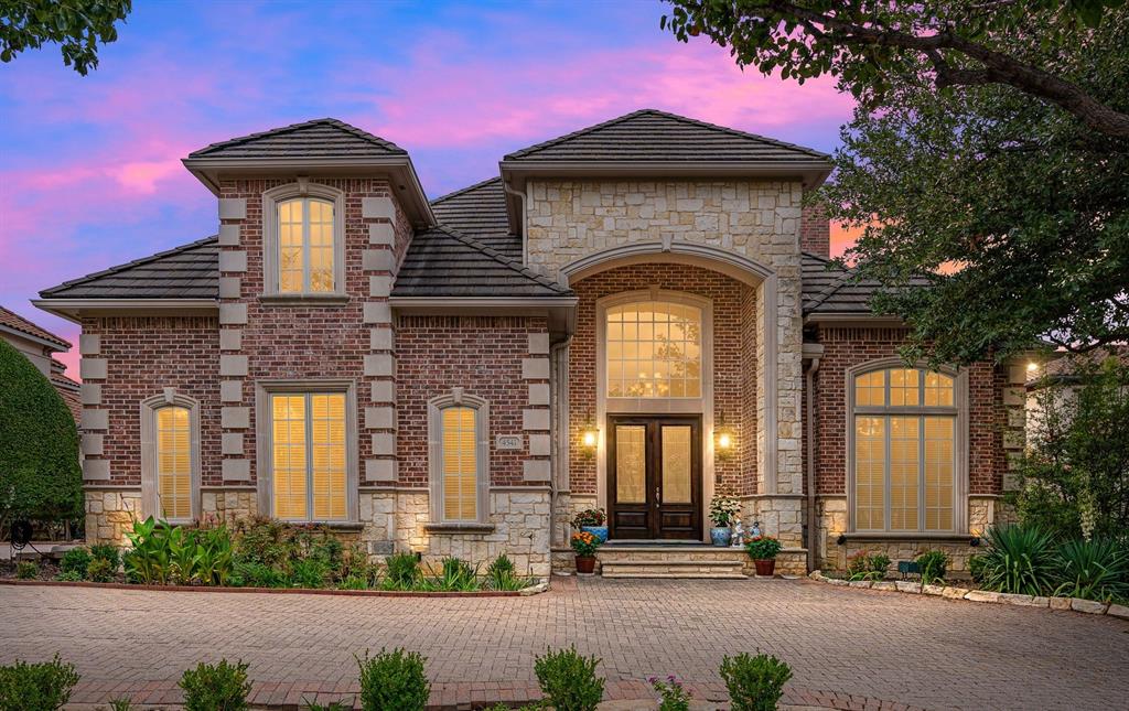 Never for sale before! Incredible custom home in the exclusive gated & guarded Enclave at Windsor Ridge. This greenbelt lot has views for miles over mature landscaping & Las Colinas. Rare layout features Primary bedroom and large in-law suite downstairs. Oversized primary has attached sunroom or office, bath with dual vanities, tub and walk in shower as well as large walk in closet & separate cedar closet. 1st Floor in-law suite features living with kitchenette, private bath & bedroom for guests or family.  Clean line kitchen opens to family & breakfast with oversized pantry. 2 separate formals enjoy hardwoods, high ceilings and elegant fireplace. Upstairs are 2 additional bedrooms with walk in closets and ensuite baths, large media room,  500+ ft2 game room bonus room and large loft with built ins. Within 15 minutes of both airports, and 20 mins of downtown you are close to it all! Enjoy country club living by driving your personal golf cart to the Las Colinas Resort and Sports club!