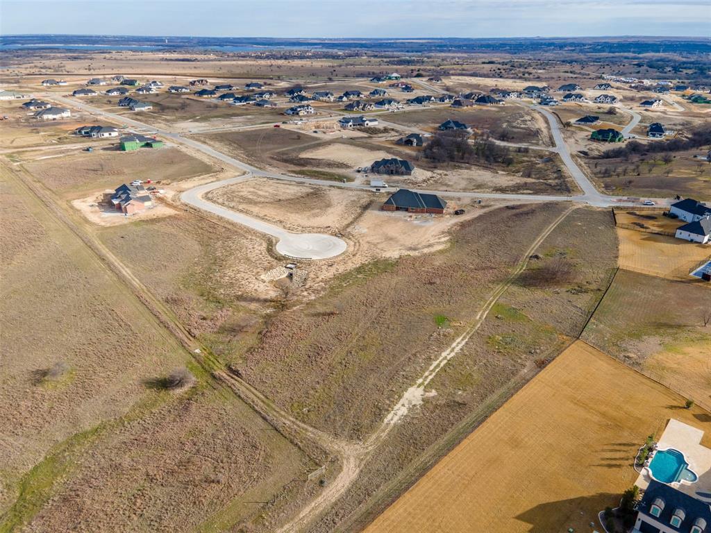 Come build your dream home in luxurious Bella Crossing in Southwest Fort Worth. 1.9 acres available with a net buildable lot of 1.5 acres on an elevated cul de sac. Bella Crossing is a wonderful development full of high end custom homes. Bring your builder and your vision for the perfect Texas Homestead! No mandatory build timeline, so even if you aren't ready to break ground you can still take advantage of this low priced opportunity, before land prices go up again! All lines in images are approximate. Buyer and Buyer's representation to verify boundaries and property lines.