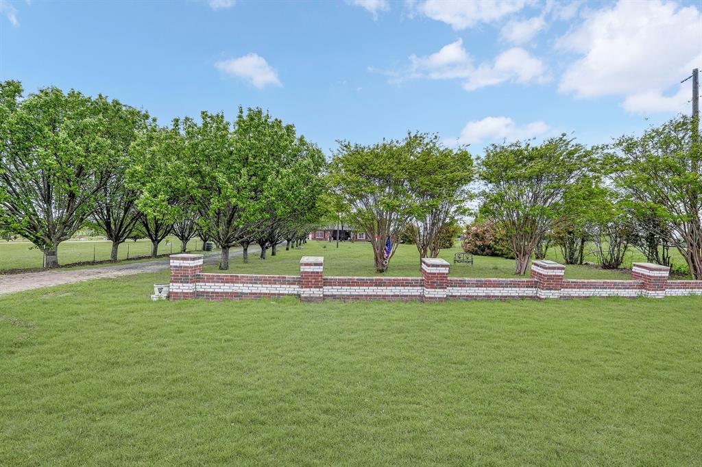 3 + or - Acres, house, various other building, Collin County, Van Alstyne ISD and ETJ.  4 bedroom, 2 bath home. South Grayson SUD provides water service, GCEC provides electric service.  The house is currently divided into two living quarters and both are occupied.  Each portion has 2 bedrooms and 1 bath.  One portion has a kitchen, living, breakfast areas and the other portion does not.  To access the back portion go out the back door, walk past the patio turn right and it will be the first door on your right.  Could be modified by purchaser to be returned to 1 SF dwelling.  Title is open at Capital Title of Texas - McWilliams.

See additional info in transaction desk documents.