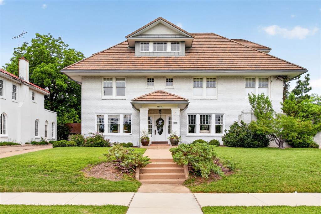 Just minutes away from downtown Fort Worth, TCU and the medical district is the beloved Ryan Place neighborhood and historic home on eponymous Elizabeth Boulevard. The 5-bedroom, 4-bath plus powder room spans more than 5,000 square feet. Upon entering the home you are greeted with original hardwood floors and limestone slab walkways, rich textures, designer tile work and wallpaper, curated antique light fixtures and thoughtful period details. The first floor features an expansive light-filled living area, large formal dining and domed hallway featuring Venetian plaster that leads to the kitchen, breakfast room and butler’s pantry. The eat-in kitchen boasts Subzero refrigeration, Wolf range and custom cabinetry. The breakfast room looks onto the garden and pool as well as an extensive arbor to the garage, cabana and carriage house. Completing the first floor is a sunroom featuring double French doors that open to an imported European fountain and private courtyard with additional French doors to the backyard spaces and dine al fresco, soak up the sun or enjoy the warmth of an outdoor fireplace. Chicago brick walkways and hardscaping complement the lush garden and mature trees. The home’s second floor boasts two master suites and two additional bedrooms with Jack and Jill bath. A multi-paned, steel frame, triple laminated safety glass skylight floods the stairway in light, directing you to the third floor featuring a bedroom wrapped with cork tiles currently used as an office, full bath, billiard room and large family room. Outside, the oversized two-car garage opens to the cabana featuring hand-carved wood lockers and full bath. Upstairs the nearly 1,500 square foot carriage house has a bonus loft for additional sleeping or its current workout area. Experience the classic charm and thoughtful design of this private estate in one of Fort Worth’s most beloved historic neighborhoods.