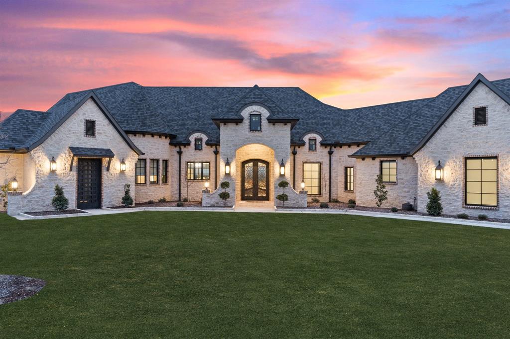 BEAUTIFUL CUSTOM-BUILT home is located in GATED GOLF COMMUNITY Canyon West. BROCK ISD! This custom floor plan, design and elevation you will find nowhere else! The home features, Marvin Doors & Windows with LIFETIME WARRANTY, Custom french cabinets, faux paint, self closing doors and drawers, 100 % foam incapsulated insulation, stonework through out, INCLUDING brick walls, back splashes and showers , a Kitchen that is a chef's dream with custom appliances, an imported Italian Range and a sound system both in the interior and exterior. You walk out to overlook the sunset and take in the CUSTOM pond that is over 1 acre with stone walls, fountain, lights, with and ingress and regress stocked with fish, custom designed retaining walls, double thick with drainage, desert scaped with oversized seating and landscape stone for those night time fires with friends and family. This home was built to entertain with the custom design pool, spa and waterfall. A MUST SEE! Not one detail missed!