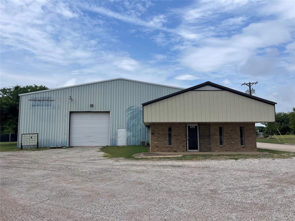 Located on East Main Street in the thriving city of Midlothian, TX, this commercial property offers a combined total of 17,451 square feet of prime space to accommodate your business needs. This is a rare opportunity to own properties that provide both office and expansive workshop areas, offering unmatched flexibility and functionality with a third building for mixed use.

Building A: 13,130 sq. ft.
This spacious property features a modern office area equipped with LED lighting and new flooring, perfect for reception and administrative functions. The large warehouse area is accessible through three bay doors, providing excellent access for operations with a drive-through option. Additionally, the warehouse includes a storage area or potential office space, complete with its own restroom, making it ideal for a variety of businesses.

Building B: 3,721 sq. ft.
Located just a stone’s throw away, this property includes a reception area, two large workshops, and exceptional access with four bay doors and a sliding door leading to the back shop. Whether you’re in automotive, manufacturing, or need space for storage and operations, this flexible layout is perfect for businesses seeking a versatile and functional space.

Building C: 576 sq. ft.
Located in the back of building B that includes a 24x24 shop. The bay door is 10x12. This can be used for storage or another shop!