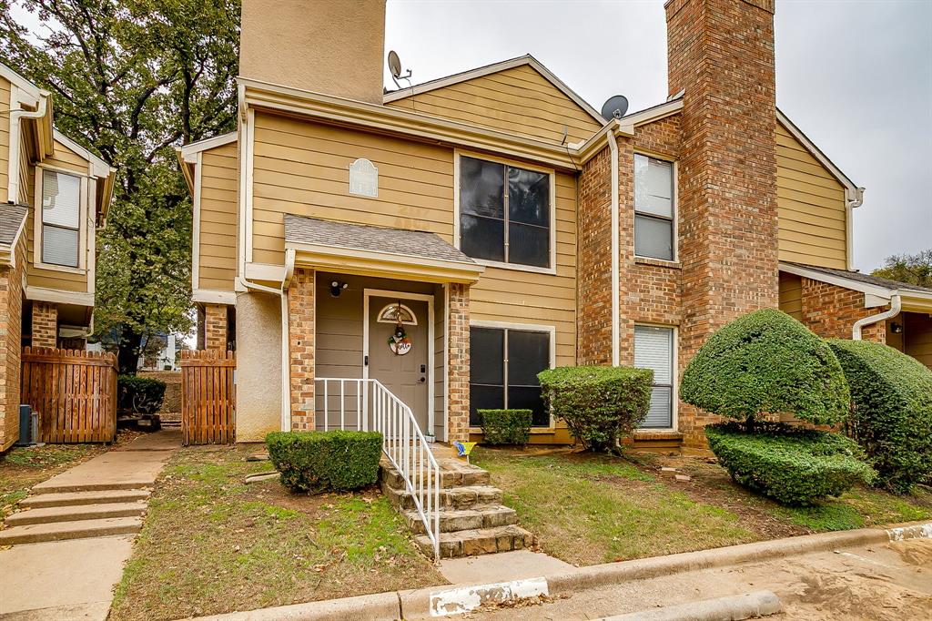Here's your chance to get into a convenient and low maintenance condo just 1.8 miles from Cowboys Stadium! Recently updated with luxury vinyl flooring, stainless steel kitchen appliances, light fixtures and paint throughout. The condo has a great cozy floorplan with an updated fireplace. The kitchen cabinets had a fresh coat of paint and gold hardware installed while the countertops got a nice trending epoxy update. Easily accessible powder bath is downstairs before you head up the stairs. The patio is private, has turf and a storage closet. Both bedrooms are on the second floor with the full size laundry room on the same floor. YES, the washer, dryer and refrigerator will stay! YES, this is unit is also Airbnb eligible! Verified by the city of Arlington, applications and fees apply. YES, the furniture is negotiable! Also, what's great about this complex is that the water, sewer, trash and exterior insurance is all covered under the monthly HOA fees.  This is a great primary residence opportunity with low maintenance costs and also has potential to be an income producing property! Come take a look!