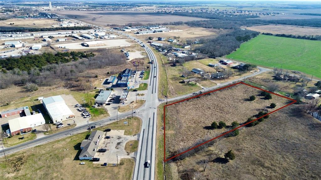 High-visibility commercial land investment in Rockwall, TX. This 3.159-acre C-2 zoned tract is located at the intersection of State Hwy 276 and Green Circle-FM 551, offering strong traffic counts and exposure in an active commercial corridor. The property is surrounded by successful neighboring businesses including a Shell gas station, car wash, donut shop, and Southern Junction, creating consistent daily traffic and demand. With excellent frontage and access, this site is well-suited for retail, restaurant, offices, or mixed commercial uses. Asking price reflects a rare opportunity to acquire a sizeable commercial parcel in a growing market with limited available land. Located in a rapidly expanding area with strong demographics and continued commercial growth, this property presents an excellent opportunity for developers seeking a well-positioned site in Rockwall. Outline is an estimate based on tax records.
