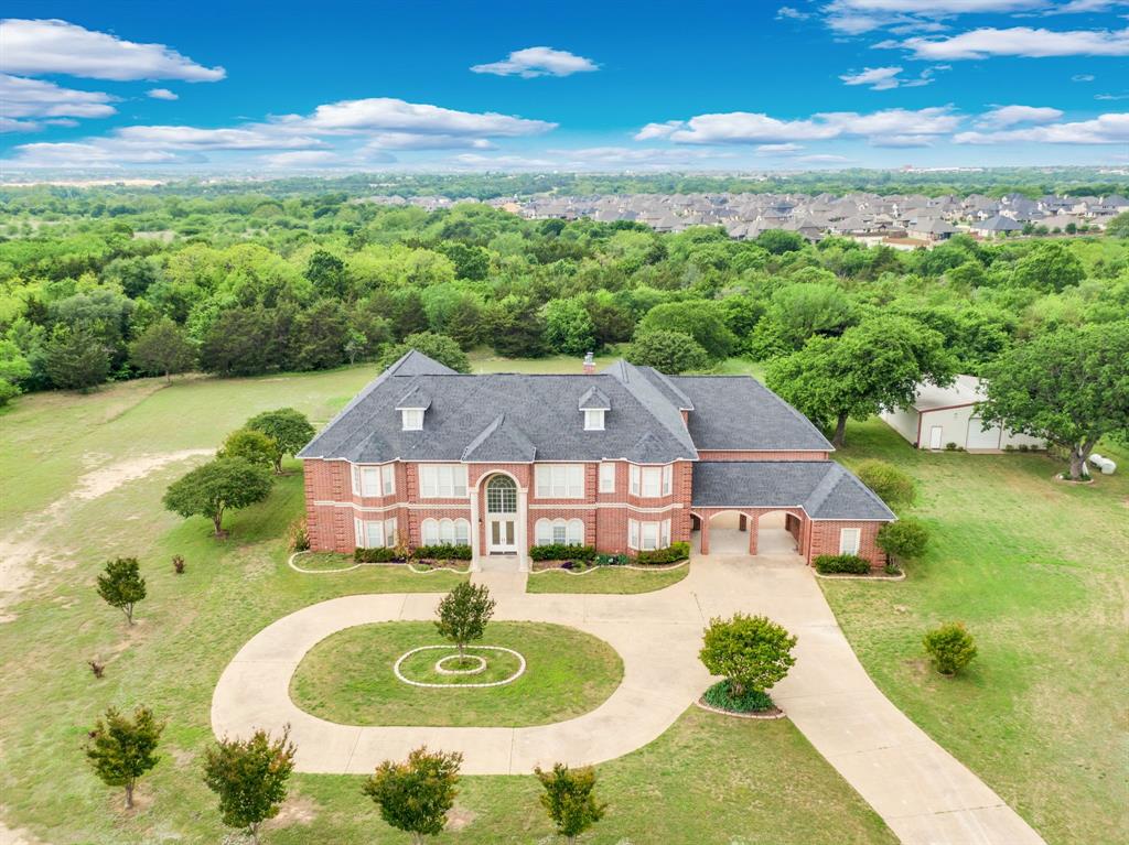 Exceptional opportunity in Midlothian featuring an expansive 8,515-square-foot estate situated on approximately 14 acres to be divided from a larger 56-acre tract. Designed with flexibility in mind, this impressive property offers 5 spacious bedrooms, 5 full bathrooms, and 2 half baths, along with multiple living and bonus areas ideal for multigenerational living, executive retreats, event hosting, or luxury short-term rental opportunities.

The layout provides endless possibilities for flex space including additional guest accommodations, offices, entertainment areas, or bridal suites. With future zoning planned for light industrial use, the property presents a rare investment opportunity for a boutique wedding venue, corporate retreat, event center, or upscale BnB concept.

The acreage offers privacy, functionality, and room for future expansion while maintaining convenient access to the growing Midlothian area. Please refer to the survey located in the Files section for the proposed acreage configuration and boundaries.

Rarely does a property combine residential luxury, commercial potential, and long-term development flexibility in one offering.