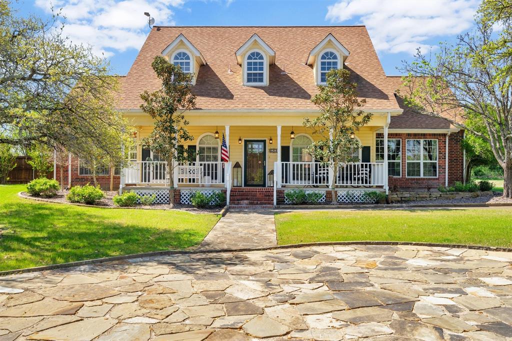 THIS 8 ACRE PROPERTY IS YOUR CHANCE TO OWN A LITTLE PIECE OF PARADISE RIGHT HERE IN TEXAS!  ENJOY A PAVED DRIVE FROM FM 730 THROUGH THE GORGEOUS TREES TO THE HOME WITH AN INVITING COVERED PORCH.  FRONT DOOR OPENS TO FOYER WITH FORMAL LIVING ON YOUR LEFT WITH A WALL OF BUILT-INS TO DISPLAY TREASURES, AND FORMAL DINING ON YOUR RIGHT.  THE SHINY REAL WOOD HARDWOOD FLOORING COVERS THESE ROOMS AND FLOWS THROUGHOUT THE COZY FAMILY ROOM WITH WOOD BURNING FIREPLACE, BUILT-IN TV CABINET, AND ON INTO THE PRIMARY BEDROOM ON MAIN FLOOR.  (WET AREAS FLOORING IS TILE; SECOND FLOOR IS CARPETED.)  WONDERFUL KITCHEN FEATURING A 5 BURNER BIG GAS COOKTOP IN THE GRANITE COVERED LARGE ISLAND WITH BREAKFAST BAR, GREAT STORAGE CABINETS, PANTRY, A POT RACK PLUS VENTED EXHAUST HOOD.  ANY COOK WILL ENJOY THE STAINLESS APPLIANCES, ALL THE CABINETS AND NICE DRAWERS, PLUS BIG SS REFRIGERATOR.  THE BREAKFAST AREA ALSO ENJOYS WONDERFUL VIEWS OUT FRONT.  THE PRIMARY BEDROOM HAS A DRESSER NOOK, SWEET SITTING AREA BY THE WINDOWS TO WATCH MOUNTED TV, AND ENSUITE BATH WITH LARGE JETTED TUB, SEPARATE SHOWER, DUAL HIGH-LOW VANITIES, AND WALK-IN CLOSET.  POOLHALF BATH FOR GUESTS.  UPSTAIRS IS 3 MORE BEDROOMS:  TWO SHARE A JACK AND JILL BATH BETWEEN.  THE 3RD BEDROOM UP HAS AN ENSUITE BATH WITH WALK-IN SHOWER--COULD CALL IT A SECOND PRIMARY.  THERE'S ANOTHER UNFINISHED BONUS ROOM AIR CONDITIONED FOR STORAGE. OUTSTANDING HEATED GUNITE INGROUND POOL-SPA LAP AND DEPTH PROFILE FOR VOLLEYBALL; AND A COVERED OUTDOOR KITCHEN WITH PROPANE GAS GRILL, SINK, REFRIGERATOR, AND A TV PLUS A FAN!  GUESTS LOVE BEING ENTERTAINED IN THE PERGOLA SEATING GROUP, THE FIRE PIT, AND ESPECIALLY HAVE FUN IN THE SHALLOW TANNING DECK AND LOVE THE PROGRAMMABLE LIGHT FEATURES.  --THERE'S TWO AEROBIC SEWER SYSTEMS: ONE FOR MAIN RESIDENCE AND THE OTHER FOR A MOBILE HOME FOR CARETAKER, FAMILY MEMBER; OR CONNECT YOUR R V OR FIFTH WHEEL TRAILER!  ENJOY COUNTRY LIVING AT IT'S BEST IN THIS TEXAS ACREAGE THAT IS READY FOR A FAMILY TO LOVE.