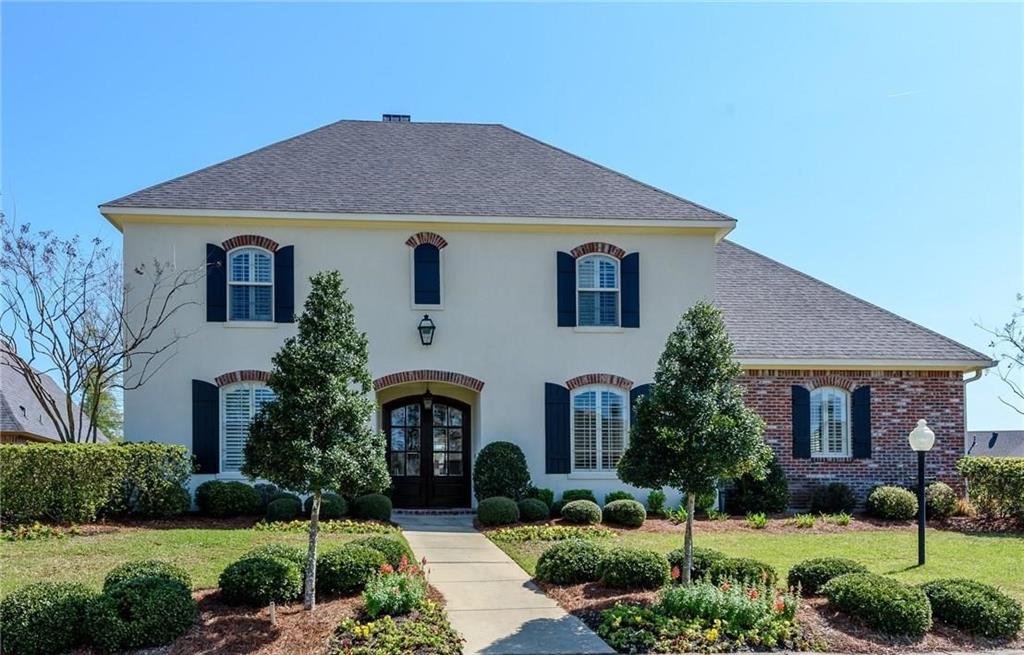 Nestled on a quiet street in St. Charles, this beautifully custom built home offers over 3,700 square feet of thoughtfully designed living space with 4 bedrooms, 3 full baths, and 1 half bath. Showcasing quality craftsmanship and stylish designer finishes throughout, the open floor plan features a formal dining room that flows seamlessly into the elegant living room with custom built-ins, a cozy fireplace, and beautiful floors. The spacious kitchen is designed for both everyday living and entertaining, featuring granite countertops, stainless steel appliances, a gas cooktop, a large center island with bar seating, a butler's pantry, abundant cabinet space, and an adjoining breakfast area that opens to the inviting family room. The private primary suite is conveniently located on the main level and offers a relaxing retreat with a luxurious ensuite bath featuring double vanities, granite countertops, a separate shower, and ample space to unwind. Upstairs, you'll find three generously sized bedrooms, two full bathrooms, a dedicated office, a spacious bonus, and brand new carpet throughout, providing comfort and versatility for family and guests. Located in desirable St. Charles on a quiet street, this exceptional home blends timeless elegance, functional design, and modern conveniences, making it the perfect place to call home.