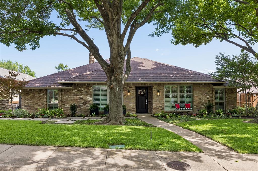 Situated on a beautifully landscaped lot in Lake Highlands, this residence offers an ideal blend of timeless design, generous living spaces, and modern comfort. Thoughtfully updated and impeccably maintained, the home welcomes you with natural light, new windows, new plantation shutters, a recently installed HVAC system, and an inviting floor plan designed for both everyday living and effortless entertaining. The spacious main living area features elegant architectural details and seamless flow into the dining spaces and kitchen. Well-appointed and functional, the kitchen offers ample cabinetry, expansive counter space, quality appliances, and a large center island that serves as a gathering place for family and guests. Adjacent living and breakfast areas create a comfortable setting for casual meals and everyday connection. The private primary suite provides a relaxing retreat with views of the backyard and a beautifully updated bath appointed with full Carrara marble finishes, dual vanities, a soaking tub, separate shower, and a custom Hollywood Closet system designed for exceptional organization and storage. Three additional bedrooms offer flexibility for family, guests, home office needs, or hobbies. Designed to maximize both indoor and outdoor enjoyment, the backyard is a true highlight. Mature trees, lush landscaping, and expansive outdoor living areas create a private oasis perfect for relaxing evenings, weekend gatherings, or entertaining on a larger scale. The pool underwent a full renovation in Fall 2025, enhancing the outdoor experience and creating a resort-inspired setting for year-round enjoyment. Located in one of Dallas' most established and desirable neighborhoods, this property offers convenient access to White Rock Lake, premier shopping and dining destinations, parks, and major commuter routes. Combining thoughtful updates, classic style, and an outstanding location, this is a rare opportunity to enjoy the very best of Lake Highlands living.