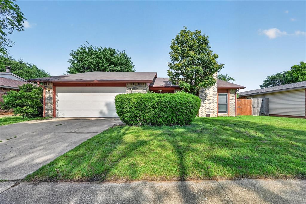 UPDATED ARLINGTON HOME * VAULTED CEILINGS * DESIGNER KITCHEN * LARGE BACKYARD RETREAT * NOW $299,000 * UP TO $5,000 BUYER CLOSING COST ASSISTANCE * SELLER OPEN TO IMPROVEMENT NEGOTIATIONS

Welcome to 2705 Treeview Drive in Arlington, TX—now priced at an incredible $299,000 and offering up to $5,000 toward buyer closing costs, plus a seller willing to consider improvement requests. Opportunities like this are becoming increasingly difficult to find in today's market.

This beautifully updated 3-bedroom, 2-bath home offers nearly 1,900 square feet of thoughtfully designed living space in a quiet, established neighborhood. Built in 1978 and tastefully refreshed, it combines timeless character with the modern finishes today's buyers want most.

Step inside to soaring vaulted ceilings, abundant natural light, wood-style flooring, and a dramatic floor-to-ceiling accent wall that creates an immediate wow factor. The inviting brick fireplace anchors the spacious living area while the open-concept layout flows seamlessly into the dining and kitchen spaces, making entertaining effortless.

The updated kitchen features:

• Quartz-style countertops
• Modern tile backsplash
• Stainless steel appliances
• Crisp white cabinetry
• Breakfast bar and eat-in dining area

The spacious primary suite offers comfort and privacy with updated finishes and an en-suite bath, while the secondary bedrooms provide flexibility for guests, family members, or a home office.

Step outside to enjoy the covered patio and oversized backyard—perfect for summer cookouts, pets, gardening, or creating your own outdoor retreat. Mature trees and established landscaping provide privacy and charm rarely found in newer communities.

Conveniently located near major highways, shopping, dining, entertainment, and everyday conveniences, this home offers the perfect balance of comfort, value, and accessibility.