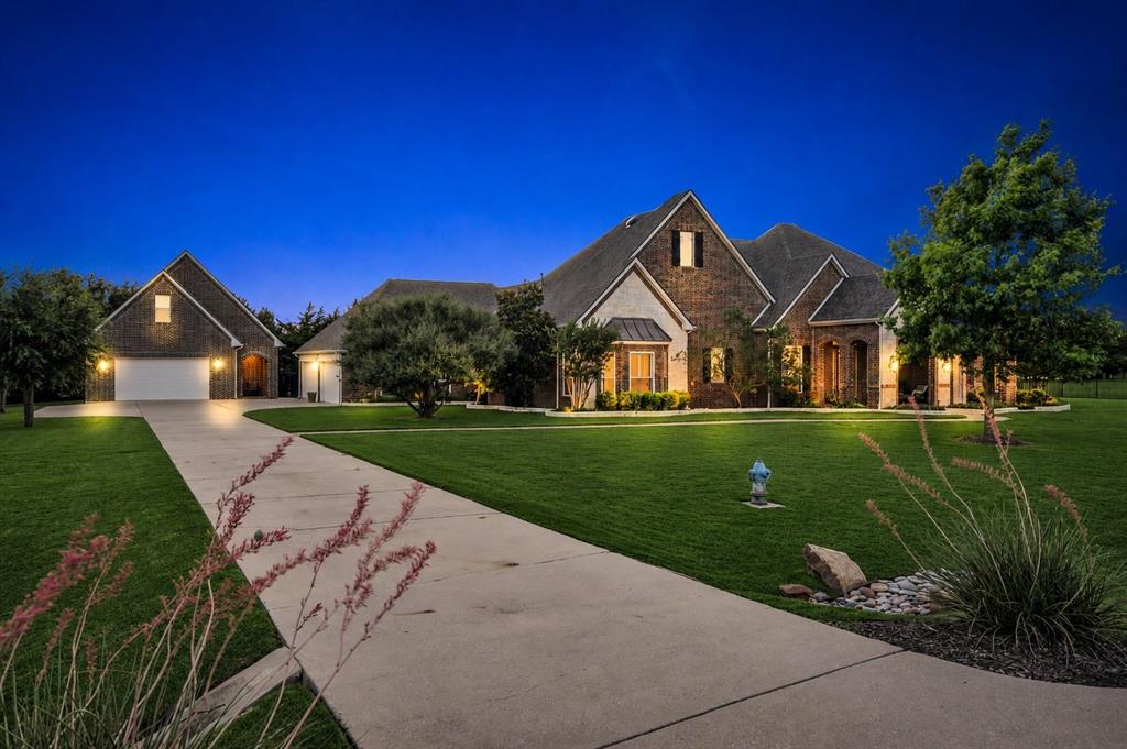 Extensively remodeled single-story home on a beautifully landscaped 1+ acre lot with exceptional outdoor living and a detached 2-car garage featuring a finished 2nd floor flex space and bonus 8' x 10' garage in back for gardening and pool supplies. Since 2019, the home has undergone a comprehensive transformation, blending timeless design with modern convenience. The kitchen was completely reimagined with stunning granite countertops, a custom island made of reclaimed box car wood, painted cabinetry, updated backsplash, new sink & faucet, stand-alone ice maker & recently replaced appliances (double ovens, microwave & gas cooktop in 2025, dishwasher 2019). Hand-scraped hardwood floors have been refinished, new carpet & fresh paint, Low-E double-pane windows, LED lighting, recessed lighting all updated. The large Primary Suite has been thoughtfully renovated with hardwood flooring, a spa-inspired bath featuring a freestanding tub, custom cabinetry, designer tile, and floor to ceiling custom closet with accent lighting & glass cabinetry. Secondary baths & laundry room have also been beautifully updated. The study and living room feature elegant wood & tile flooring. Three large living areas offer flexibility for both everyday living & entertaining. Step outside to a private backyard retreat featuring a PebbleTec pool with waterfall features, updated equipment including a variable-speed pump, cartridge filtration system, heater, Wi-Fi automation, and a spacious covered patio with wood ceilings, built-in grill & granite countertops. Also, redesigned landscaping with lighting, and a huge side yard with raised garden beds provide ample space for entertaining, pets & play. Additional improvements include security cameras, wrought-iron fencing, upgraded irrigation. New impact resistant roof, gutters, downspouts, & decorative exterior lighting 2025. This move-in-ready property offers an exceptional combination of indoor comfort, outdoor enjoyment & flexible living space.