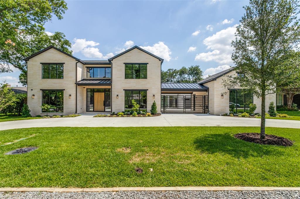 Experience luxury living at its peak! Step through the white oak & steel door into a grand foyer leading to a sophisticated study, dining area bathed in natural light, both adorned with Phillip Jeffries wall coverings. The kitchen is a chef's paradise, boasting exquisite cabinets, quartz counters, expansive island with a built-in table, wine refrigerators, and a see-through fireplace. The great room features full pocket sliding doors, seamlessly connecting indoor-outdoor spaces overlooking the patio & fireplace. Adjacent, the family room offers a wet bar for effortless entertaining. The opulent primary suite boasts a fireplace, lavish bath with separate vanities, water closets, an oversized shower leading to an incredible closet. An additional bedroom downstairs adds flexibility. Upstairs, discover 4 ensuite bedrooms, a reading nook, &  an extra living area. Outside, a gated motor court leads to a 4-car garage, complemented by the inclusion of an elevator for ease of access throughout.