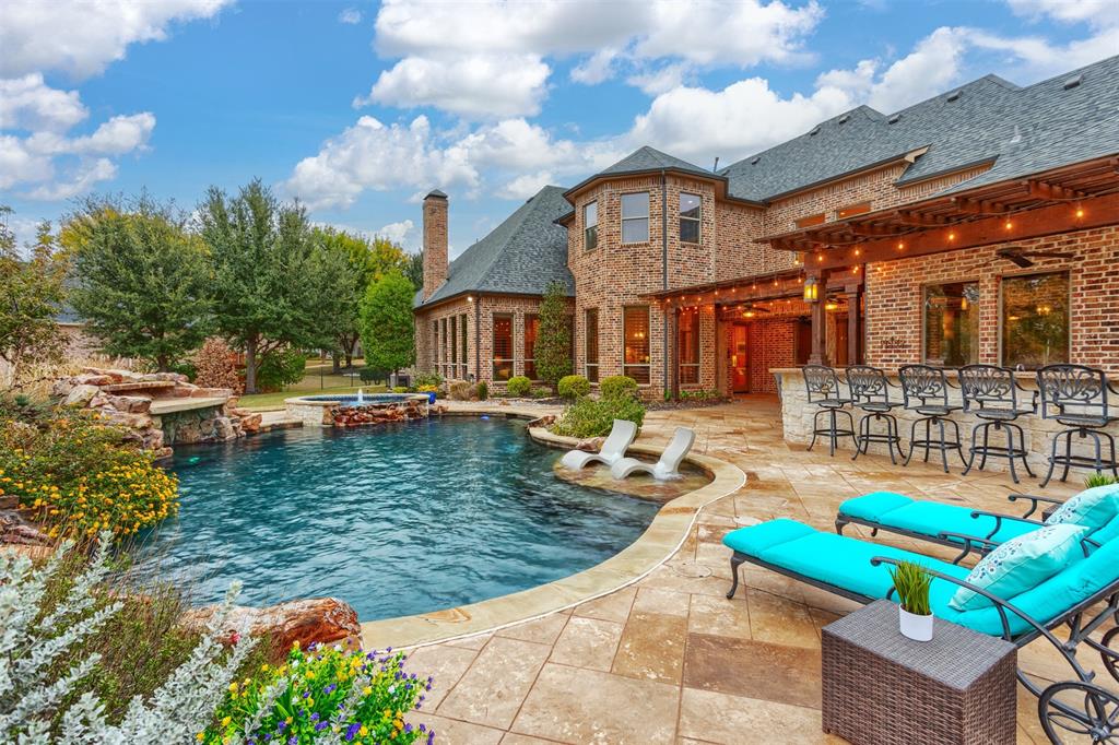 This beautiful custom home in gated Stonebridge Estates sits on just under 1 acre.  From the sweeping entry to the fabulous outdoor living you will be impressed!  Primary and a a guest suite downstairs on opposite sides of the home. Also downstairs, the large executive study, formal dining with wine room, utility, large open kitchen and family rooms are all sure to please.  Primary bedroom closet features built ins and a washer dryer hookup. Upstairs is a game room, 3 large bedrooms, full sized media room plus an additional bonus room off media that can be additional bedroom or workout space.  The 4 car garage features special flooring and has custom built in cabinets.  The backyard oasis will have you spending hours in the large pool, or enjoying the covered outdoor living.  A generator that can power almost the entire home included. All information stated herin is believed to be accurate but should be verified by Buyer.  Buyer backed out with due to no fault of the seller.