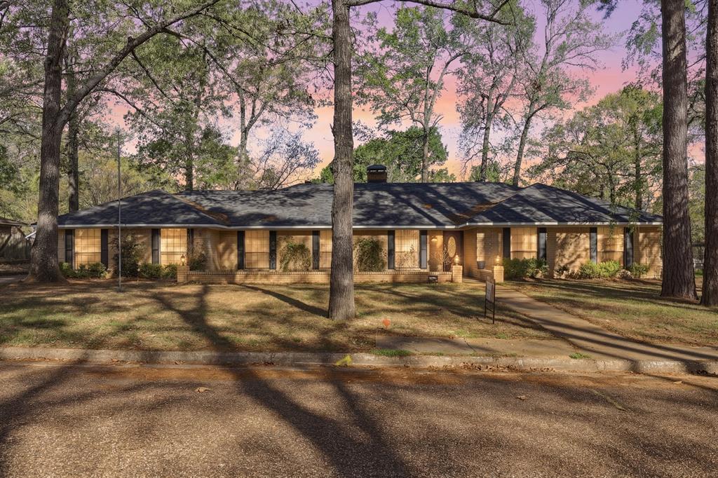 Located in a well-established area of Quitman, this spacious 4-bedroom, 2.5-bath home offers a thoughtful layout designed to accommodate both everyday living and larger gatherings. With approximately 2,631 square feet, the home provides multiple living and dining areas, creating flexibility for a variety of lifestyles.

Inside, you’ll find two separate living rooms, along with both a formal dining area and a dedicated breakfast space, allowing for easy flow and functional use of space. The generously sized bedrooms offer comfortable retreats, while a pellet-fueled fireplace insert adds efficiency and warmth during cooler months.

Outdoor living is equally well-considered, with expansive front and back patios that extend the usable living space. The backyard is designed for relaxation and enjoyment, featuring a pool and a hot tub equipped with built-in Bluetooth speakers and ambient lighting—ideal for unwinding or hosting guests.

Additional features include a two-car garage and a separate carport, providing ample parking and storage options. Conveniently located just minutes from local schools, shopping, dining, and healthcare facilities, this property combines space, function, and accessibility in a central Quitman setting.