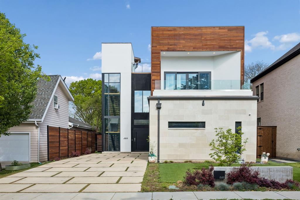 Located in Little Forest Hills and in close proximity to White Rock Lake and the Dallas Arboretum, this custom built three-story home features 3,988 square feet of comfortable living space with three bedrooms, three full baths, multiple patios including a 2,200 square feet rooftop deck, level 5 walls and paint, 3-car garage, and a fully turfed yard with pool and spa. Upon entering, soaring ceilings greet you with acacia natural wood floors that lead you into the living and dining areas. The chef’s kitchen is outfitted with Sub-Zero and Wolf appliances and is highlighted by the climate controlled wine cellar and quartzite countertops. Also located on the main level is a guest bedroom with an en-suite bathroom and custom closet. The second floor features a large study area with built-in desk, game room with patio access, spacious laundry room, and an additional bedroom as well as the primary with a custom, European-style closet and large balcony. The primary bath includes dual vanities, a soaking tub, and steam shower with multiple shower heads. On the third floor is the rooftop deck that spans over 2,000 square feet, perfect for entertaining. Comfortable living continues outdoors on the main level with a cast stone wrapped covered patio that includes a large fire place, all highlighted by the turfed yard and mosaic tiled pool and spa.