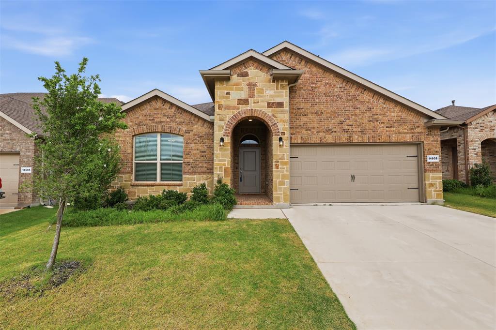 * WHY WAIT WE ARE MOVE IN READY* Welcome to this move-in ready, single story, beautifully maintained home in the highly sought-after Northstar community! This like new 4 bedroom, 2 bathroom home offers the perfect blend of comfort, style, and functional living space. Designed with entertaining in mind, the open-concept floorplan seamlessly connects the kitchen, dining, and living areas to create a bright and inviting atmosphere. Main living spaces feature durable, low-maintenance wood-look tile, while the bedrooms offer cozy carpet for added comfort. Updated entry and kitchen light fixtures add a modern touch throughout. The kitchen is a standout feature with a gas cooktop, ample cabinet and counter space, and a large center island perfect for gatherings. The private primary suite offers a relaxing retreat with an ensuite bath featuring dual vanities, a walk-in shower, and a spacious walk-in closet. A built-in study nook off the living area creates the perfect flex space for working from home, homework, or everyday organization. A functional mud bench at the garage entry adds convenience and storage. Situated on a desirable lot backing to open land, this home offers added privacy with no rear neighbors. The backyard is ready for your personal vision, whether you dream of a garden, outdoor kitchen, or play space. Additional upgrades include full gutters and French drains along both sides of the home. Washer, dryer, and refrigerator convey for added value and convenience. Residents of Northstar community enjoy exceptional amenities including a clubhouse, playground, and two sparkling pools. Located within the highly acclaimed Northwest ISD and within walking distance to an elementary school. This like new, move in ready home offers low-maintenance living, an easy and very functional floorplan and an unbeatable location! Schedule your showing today!