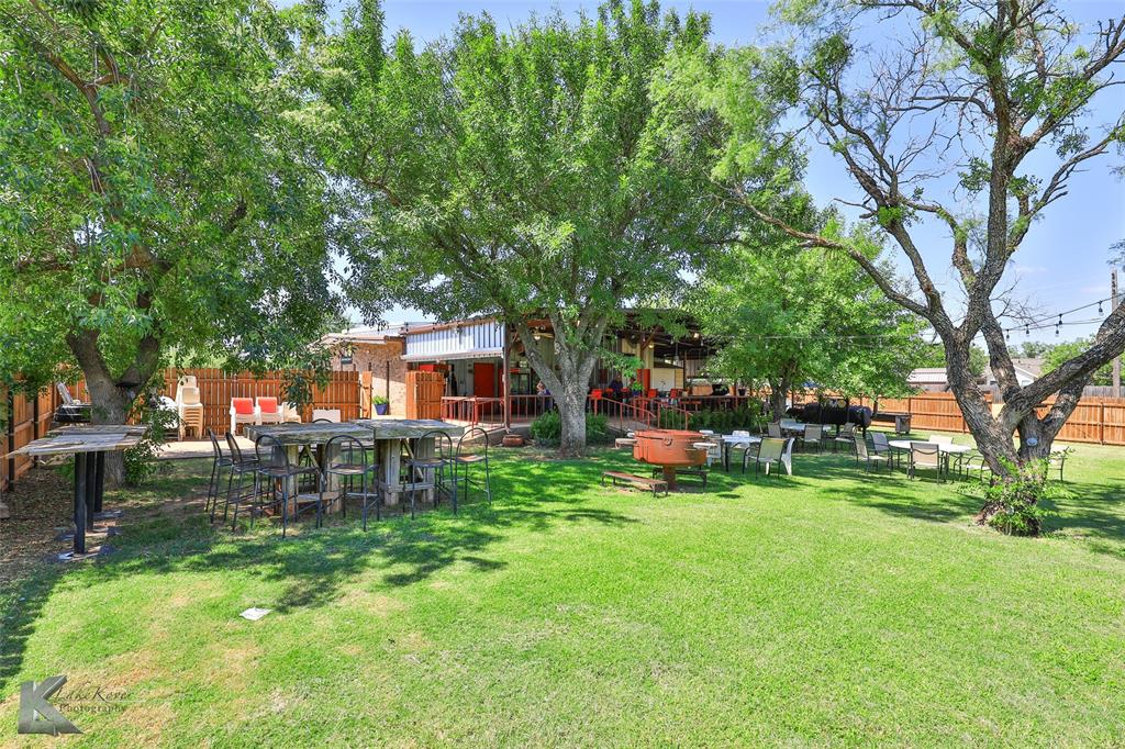 OWNER WILL CONSIDER ALL REASONABLE OFFERS!  Beautiful Office and Event Venue Ready for you business!  A wide variety of businesses would find this beautiful place to be the perfect home.  Venue can host large events and is fully equipped with kitchen and plenty of grills and smokers, and a bar.  Three sliding door coolers are included to make it easier for anyone utilizing the space.  Plenty of tables and chairs are also included and an air conditioned bathroom.  Family reunions, parties, weddings, fund raisers, etc. have all happened here.  Plenty of parking for the venue in lot behind the main building.  Beautiful and well appointed outdoor area.  Venue currently rents at $1000 per day.  Office contains five renovated executive offices and a conference area, as well a break area and kitchenette.  Owner is relocating.