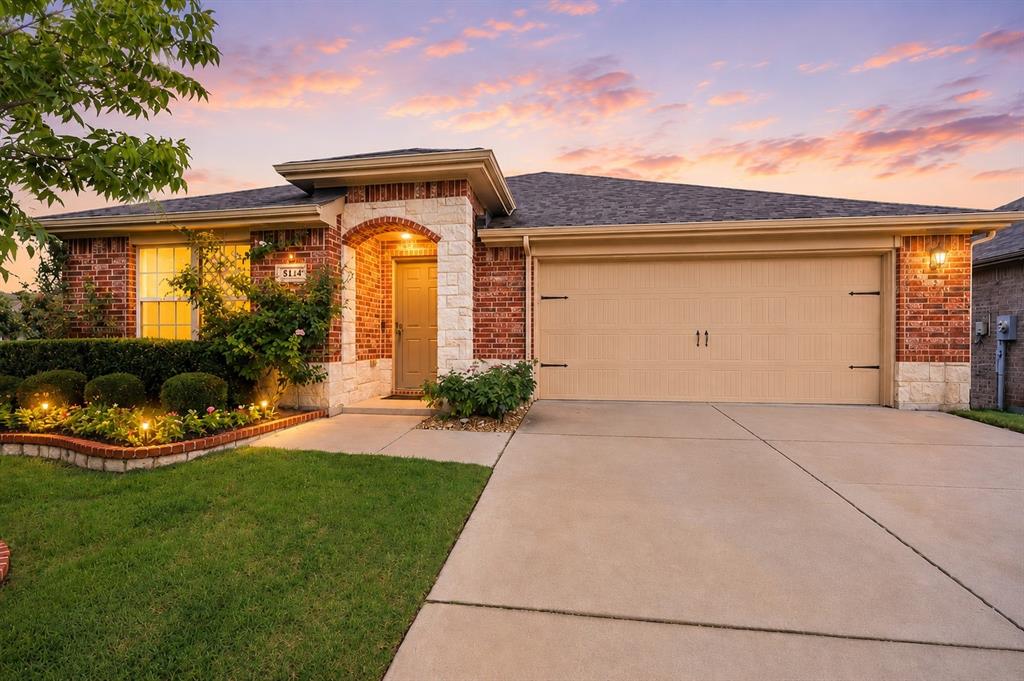 Welcome to this beautifully maintained 4-bedroom, 2-bath home in the highly desirable community of Fate, Texas! Situated on a premium corner lot that backs to approximately 6 acres of green space, this property offers added privacy and peaceful views rarely found in neighborhood living.

Inside, you'll love the open-concept layout that seamlessly connects the living room, dining area, and kitchen, creating the perfect space for entertaining and everyday life. The kitchen features granite countertops, a flat-top induction cooktop and a spacious walk-in pantry. Durable tile flooring flows throughout the main living areas for easy maintenance and timeless appeal.

The private primary suite includes an ensuite bath, while three additional bedrooms and a full bath are conveniently located off a separate hallway. The laundry room is tucked away nearby and offers direct access to the attached two-car garage.

Step outside to enjoy your own backyard retreat complete with a pergola-covered patio, hot tub, professional landscaping, and extensive French drain systems installed in both the front and back yards for added peace of mind.

Residents enjoy access to outstanding HOA amenities, including multiple resort-style pools, outdoor kitchens, fitness center, clubhouse, dog park, soccer field, playgrounds, putting green, and scenic ponds. With its desirable location, thoughtful upgrades, and exceptional community features, this home offers the perfect blend of comfort, convenience, and outdoor living.