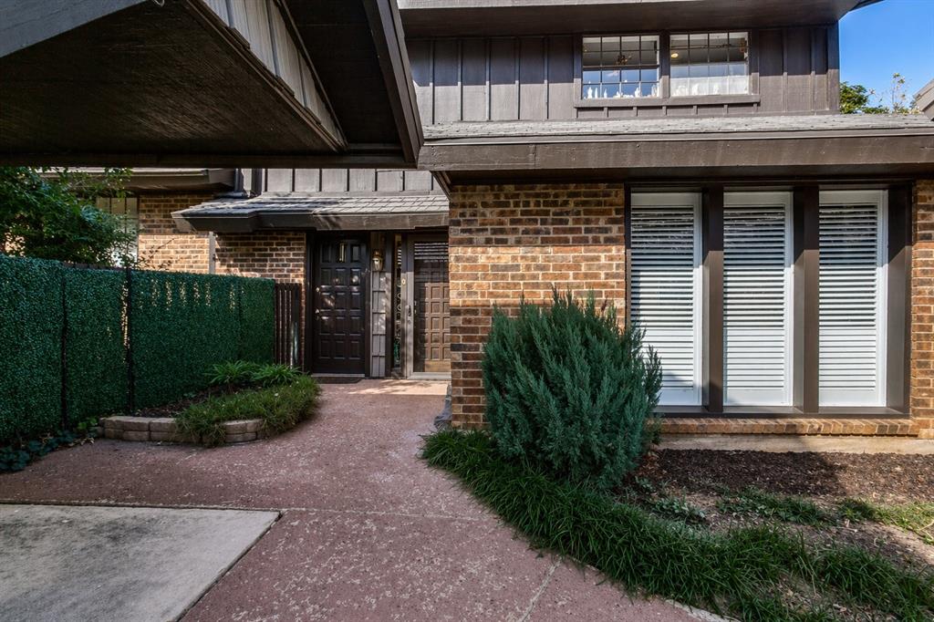 Nestled in a lush North Dallas community, 6959 Helsem Way #139 is a beautifully updated 3-bedroom, 3-bath condominium offering approximately 2,534 sq. ft. of spacious living. This two-level garden-style home features dual primary suites upstairs, each with walk-in closets and fully renovated marble and quartz bathrooms. The updated kitchen, completed in 2021, showcases stainless steel appliances, tile backsplash, and a large pantry, while the oversized living room centers around a cozy gas fireplace and opens to a private patio surrounded by mature landscaping. Built in 1974, the home combines classic character with modern updates, tile flooring, decorative lighting, and abundant storage. Residents enjoy access to exceptional community amenities such as a pool, clubhouse, fitness center, tennis and pickleball courts, and two covered parking spaces. Located in the quiet Hillcrest Condos near top-rated schools, shopping, and major thoroughfares, this home offers the perfect blend of comfort, convenience, and North Dallas charm.