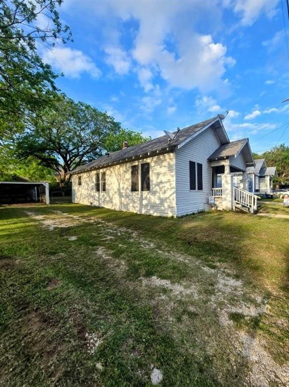 This 2 bedroom, 1 bathroom home sits on a spacious lot in a quiet Gainesville neighborhood.  Built in the 1930s, it offers solid bones and a traditional layout.  This property could easily be a resale, rental, or residential home. The covered front porch is south facing for warm evenings and cozy morning coffee.   The fenced in backyard is perfect for gatherings, as well as a play area for children and pets. Recent updates include flooring in the backroom, and plumbing updates in the bathroom.