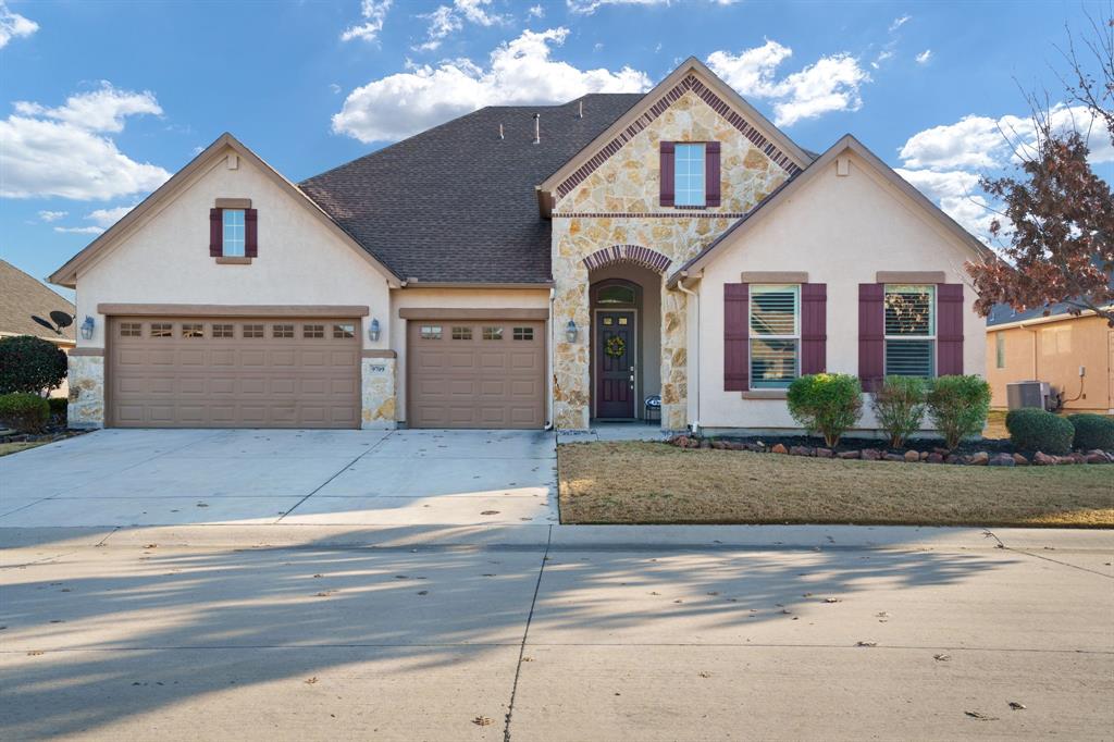 Welcome to 9709 Stonewood Drive in the highly sought-after 55+ Robson Ranch community of Denton. This beautifully maintained Ashland model features timeless stucco and stone elevation and is filled with natural light throughout. The open, spacious floor plan is ideal for entertaining, with plantation shutters, custom window treatments, and a chef’s kitchen showcasing a large island, butler’s pantry, and oversized walk-in pantry—all overlooking the living and dining areas. The serene primary suite offers dual sinks, soaking tub, separate shower, and two generous closets. A private den provides flexible office space, while the second-floor retreat includes a half bath, walk-in closet, and attic access. The oversized garage has room for two golf carts and a separate air conditioned workshop! Enjoy the covered patio with motorized screens, lush landscaping, water feature, and greenbelt views. Located in Robson Ranch, residents enjoy championship golf, resort-style pools, clubhouse dining, fitness center, and endless social activities. Impeccably cared for, bright, and move-in ready.