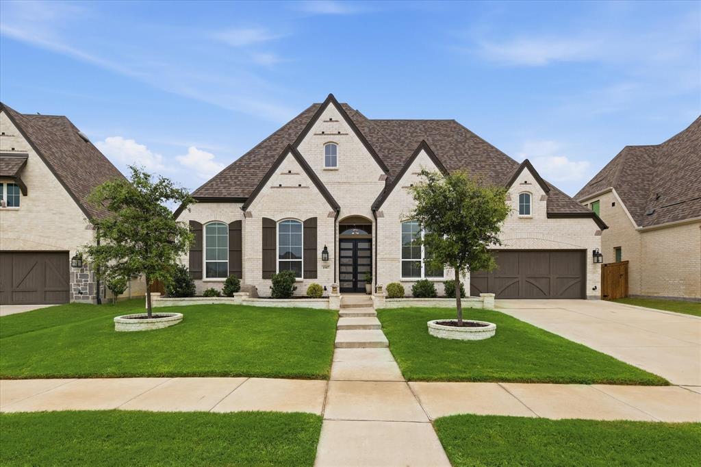 There's something appealing about moving into a home where the decisions have already been made and everything is ready from day one. Built in 2022 and meticulously maintained by its original owner, this home gives the feel of new construction without the wait.

Three secondary bedrooms are positioned near the front of the home, including one with its own private bath—ideal for guests or multigenerational living. A dedicated office near the entry provides a quiet place to work from home, while two additional living spaces create room for movie nights, game days, hobbies, or whatever fits your lifestyle.

At the center, the kitchen keeps everyone connected. Whether it's busy mornings around the island, helping with homework at the counter, or gathering with friends on the weekend, this space was designed to be used. Custom glass-front cabinetry, stainless steel appliances, and a stylish backsplash blend function with character.

Large windows fill the main living area with natural light and overlook a backyard with no rear neighbors, offering an added sense of privacy. At the end of the day, the primary suite becomes a retreat of its own, complete with a sitting area, freestanding tub, walk-in shower, and an oversized walk-in closet.

A flex room with barn doors offers endless possibilities—from a home gym or playroom to a craft room or second office. The 3-car tandem garage provides valuable storage, while all plumbing located within interior walls reflects the thoughtful design found throughout the home.

Located just steps from the neighborhood park and within the sought-after M3 Ranch community, residents enjoy access to a clubhouse, pool, and neighborhood amenities while remaining minutes from shopping, dining, entertainment, and everything Mansfield has to offer. Homes like this are the reason buyers choose M3 Ranch—a layout that works, a community that delivers, and a home that feels right from the moment you walk in.