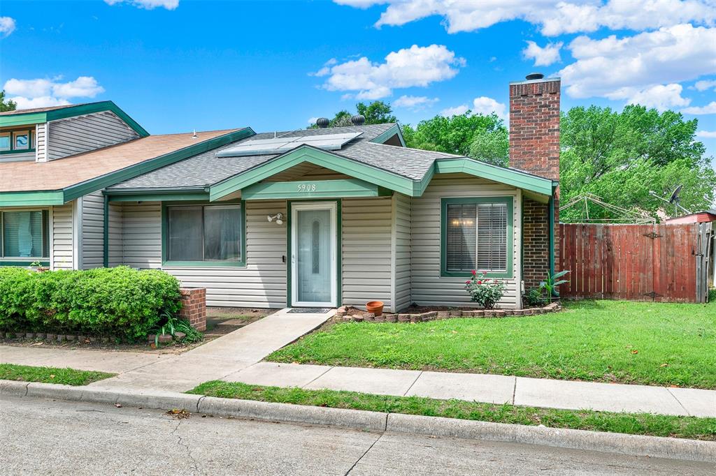 MOVE-IN READY! Enjoy the benefits of low-maintenance living and reduced utility costs in this charming duplex. Pristine and thoughtfully updated with new luxury tile in kitchen and spacious work shed out back. This home offers peace of mind and long-term value, having major system improvements already completed, including new plumbing in 2024, a roof replaced in 2019, and solar panels that will be paid off at closing, allowing the next owner to enjoy immediate energy savings with no solar loan payments. 
Designed for easy living, the open-concept layout creates a comfortable flow between the living, dining, and kitchen areas. The kitchen features name new updated modern tile A cozy fireplace anchors the living room, while the kitchen features new flooring, ample cabinetry, and functional workspace. Natural light fills the home, creating a bright and welcoming atmosphere throughout. The spacious bedrooms provide comfortable retreats, and the manageable outdoor spaces allow you to enjoy the outdoors without the upkeep of a large yard. A covered back patio offers the perfect spot for morning coffee, outdoor dining, or relaxing with friends and family, while the side yard provides additional green space to enjoy.

Whether you're looking to simplify your lifestyle, reduce monthly expenses, or avoid costly near-term repairs, this home delivers. Conveniently located in Arlington near major highways, shopping, dining, and everyday amenities, you'll enjoy easy access to everything you need while benefiting from energy-efficient features and significant capital improvements already completed. Move in, settle in, and spend less time worrying about maintenance and utility costs while enjoying all the comforts of home.