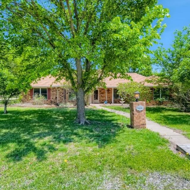 Recently appraised at asking price! Great investment opportunity!! Spacious well-maintained 3 bedroom 2 bath home in a great location across the street from Shackelford Elementary School. Sited on over half an acre with incredible mature landscaping and a massive private backyard. Step inside from the inviting covered front porch to the family room with a cozy brick fireplace, beautiful built-ins, a tray ceiling with can lighting, and plenty of room for entertaining. The galley eat-in kitchen is a good size and is beautifully updated with granite, SS appliances, gorgeous cabinetry, and under-cabinet lighting that highlights the backsplash. The breakfast area has french doors that lead to the formal living room. Luxurious primary bedroom with a decorative tray ceiling, a massive walk-in closet, and a 5-piece bath with a garden tub and separate shower. The guest bath has a jetted soaking tub-shower combo. The home is clean and ready for new owners.