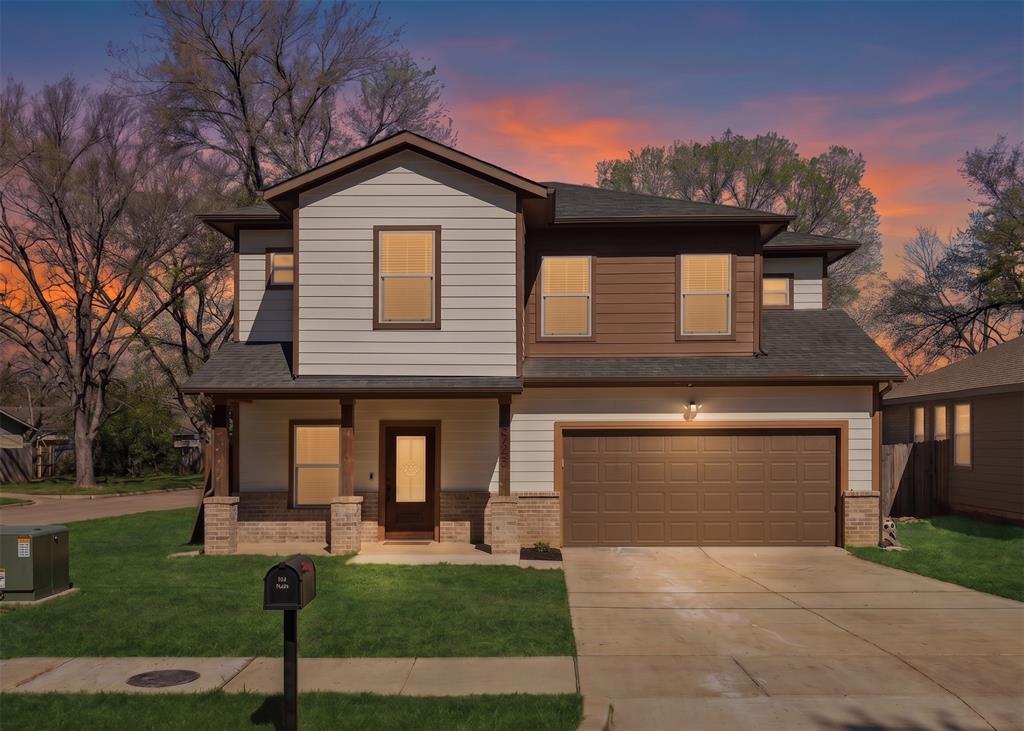 Built in 2023, this beautifully designed two-story home offers modern style, a functional layout, and an unbeatable location just minutes from downtown Dallas. With 4 bedrooms, 2.5 baths, and approximately 1,748 square feet, the home provides a bright, open-concept living space ideal for both everyday living and entertaining. The spacious living area is anchored by a striking stone fireplace, creating a warm and inviting focal point. It flows seamlessly into the kitchen, where granite countertops, stainless steel appliances, custom cabinetry, and a large island provide both style and functionality—perfect for hosting and gathering. The primary bedroom is conveniently located downstairs, offering privacy and ease of access. This inviting retreat features an ensuite bath with dual vanities, a walk-in shower, and a generous walk-in closet. Upstairs, three additional bedrooms provide flexible space for guests, home office, or hobbies, along with a well-placed laundry room for added convenience. Enjoy outdoor living with a welcoming front porch and a large backyard offering plenty of room for recreation, pets, or future enhancements. A two-car garage adds convenience and storage. Ideally situated near parks, trails, dining, and entertainment along the Trinity River corridor, this home combines comfort, modern finishes, and a prime location. Move-in ready and designed for today’s lifestyle—schedule your showing today.