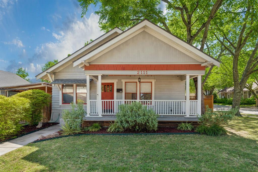 Timeless 1940 Craftsman bungalow perfectly positioned on a prominent corner lot in Fort Worth's coveted Fairmount Historic District. Rich in architectural character, this beautifully maintained historic home showcases the classic details that define Craftsman design, including a full-width covered front porch, front-gabled roofline, wide overhanging eaves, and exceptional curb appeal. Thoughtfully updated while preserving its original charm, this residence offers the perfect blend of historic character and modern comfort. Inside, warm hardwood floors, abundant natural light, and inviting living spaces create an atmosphere that is both welcoming and timeless. The functional floor plan features two spacious bedrooms, a well-appointed bath, and a charming kitchen that balances period character with everyday convenience. More than $38,000 in recent improvements provide valuable peace of mind, including a full HVAC replacement, sewer line replacement, and foundation maintenance. (See Transaction Desk for the complete list of improvements.) Relax on the expansive covered front porch, the perfect place to enjoy morning coffee, visit with neighbors, or unwind after exploring one of Fort Worth's most vibrant neighborhoods. Just minutes from Magnolia Avenue, the Near Southside, downtown Fort Worth, the Medical District, boutique shopping, local restaurants, entertainment, and cultural attractions, this move-in-ready home offers a rare opportunity to own a piece of Fort Worth history while enjoying the convenience of city living.