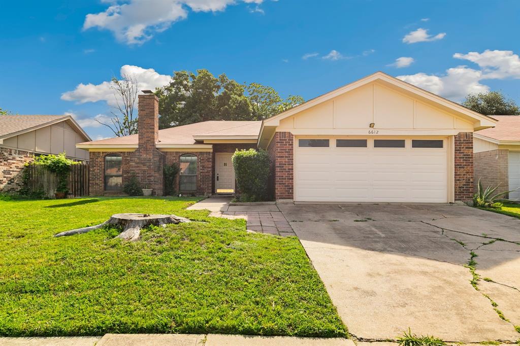 Well-maintained, charming 3-bedroom, 2-bath home in the heart of Watauga! This 1,392 sq ft home features a spacious living room with a cozy wood-burning fireplace and beautiful laminate flooring throughout much of the home. The updated kitchen offers painted cabinetry, granite countertops, black stainless sink with accessories, new disposal, and range—perfect for everyday living and entertaining. Fresh paint in most of the home, brand new doors on bedrooms and bathrooms and brand-new carpet in the bedrooms make this home move-in ready. Secondary bedrooms include walk-in closets, while the primary suite boasts an en-suite bath with updated vanity, granite counters, new bathtub, and two walk-in closets. Enjoy direct access from the primary bedroom to the backyard patio. Step outside to a lush, green backyard featuring a covered patio with ceiling fan, additional patio spaces, a wood deck, and mature shade trees—ideal for relaxing, playing or hosting guests. A 12x16 storage shed provides extra space for tools and equipment. 2 car garage with extra shelving and storage space and garage door opener. Conveniently located in a quiet, friendly neighborhood near shopping, dining, and easy access to Hwy 377!