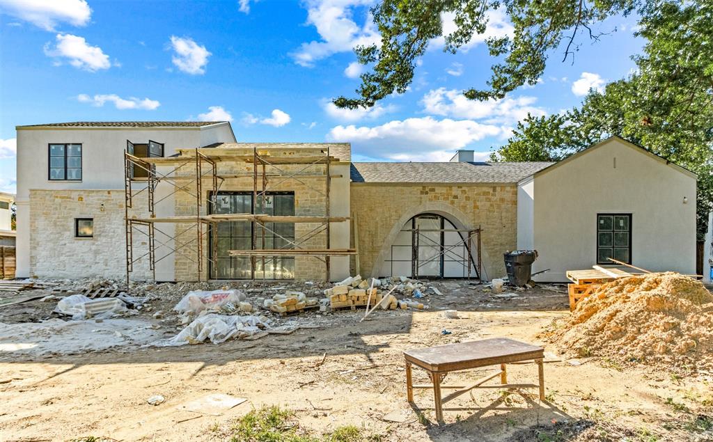 Experience this sophisticated coastal modern new construction designed and built by M&E Development, which is the absolute best in design, technique, and presentation. Situated in the highly coveted private school corridor on an oversized lot on a picturesque street. This over 5,000 sf trophy property features a first-floor owner's suite, optional first-floor guest space, a gourmet kitchen with soaring vaulted ceilings, and sliding glass walls overlooking an oversized patio and private backyard. The second floor features an oversized playroom or game room, and three bedrooms with en-suite baths. Impress the most discerning buyers with white oak cabinetry, custom arch windows, a floating staircase, full arch pass-throughs, and a stunning showcase of full slab marble details. The home is under construction, and plans and design are subject to change. The pool is for conceptual use only and is not included in the price.