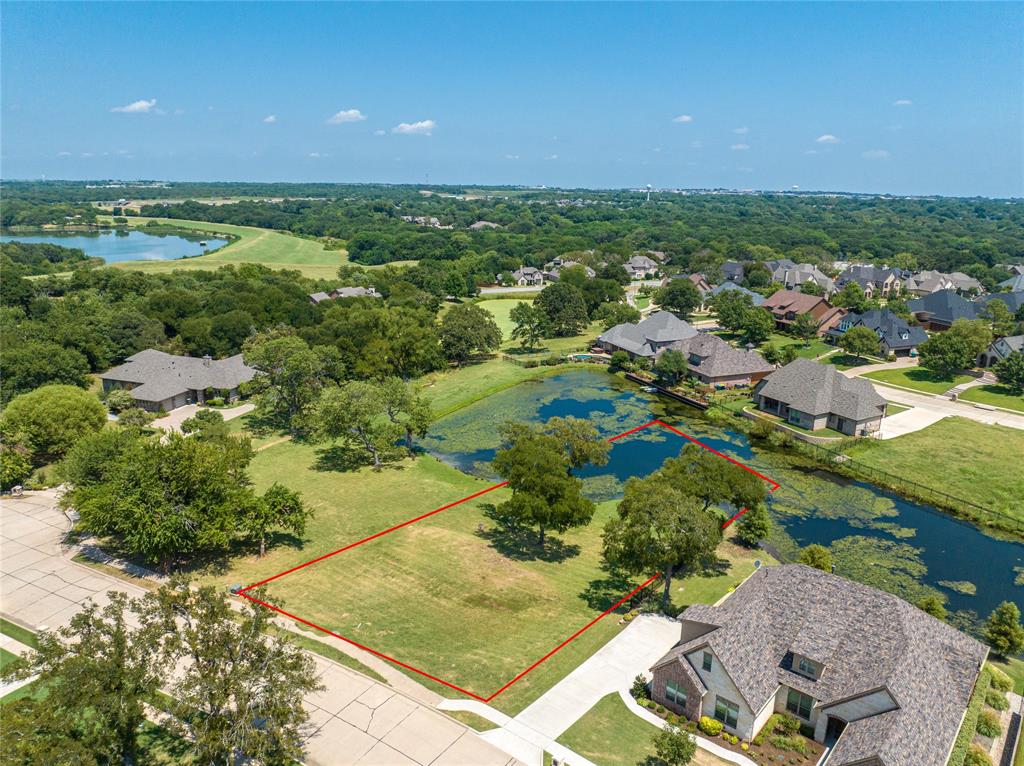 Welcome to this exceptional .57 acre lot located in the coveted O'Hanlon Ranch Addition. The boundaries of this lot stretch into the pond, giving you a waterfront view and partial ownership of the well-stocked waters boasting perch, bass, and catfish. This property is just a brief stroll from the beautiful Pecan Grove Park. Feel welcome to walk this property during daytime hours.