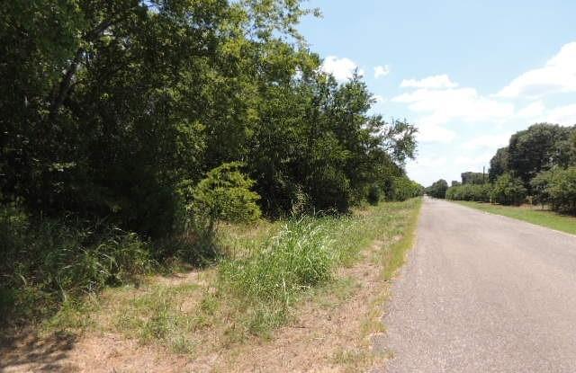 Land Only. Rare and Unique, Feast your eyes on these 2 parcel lots - 21270 and 21278.  This property is awesomely unique.  Enter from County Road 3303 and build or place your new residence here or enter from Highway 69, for a private drive to connect the two parcels.  Either entrance, it all belongs to one owner.   Adjoining properties on County Road 3303 is 1.72 acres and Highway 69 property is .29 acres according to the tax records.  Both properties, combined to make one large property according to original platmap.  Agents