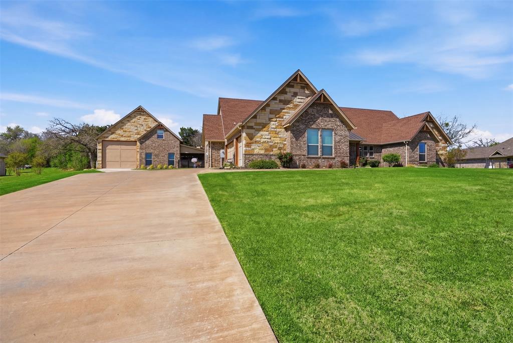 MOTIVATED SELLER. Come see this stunning estate that boasts over 1.2 acres of pure retreat. The main house has 4 large bedrooms and 3 full bathrooms. The primary bedroom has great natural light and access to the covered back porch.  All of the bathrooms are meticulously designed for convenience and comfort. The primary bedroom has access from the closet to the laundry room for great convenience. All of the house has great closet space and ample storage. The secondary bedrooms are all very large and have beautifully designed bathroom access. The main house space is open and airy and has great access to the wonderful backyard. The house has an open floorplan that is perfect for entertaining or just relaxing with family and friends. The kitchen has beautiful cabinetry and wonderful granite countertops for a warm and inviting feel. The dining room has great space for eating, or you can keep it casual at the breakfast bar. The yard is beautifully fenced but also has space for endless possibilities. The main house shares the backyard space with a full accessory dwelling unit complete with that could be shop, guest house, RV storage, boat storage, you name it. RV storage will accommodate Class C or Super C coaches and has 2 levels of fully finished climate-controlled space. The outdoor patio of the accessory building has an outdoor fireplace and an outdoor shower. With a combined sq footage of the main house and accessory building at 4681, this property has great value at about 176 sq ft. You will not want to miss this great and unique property. Buyer and buyers' representative to verify all information. Open house Sat, July 25 1-4pm