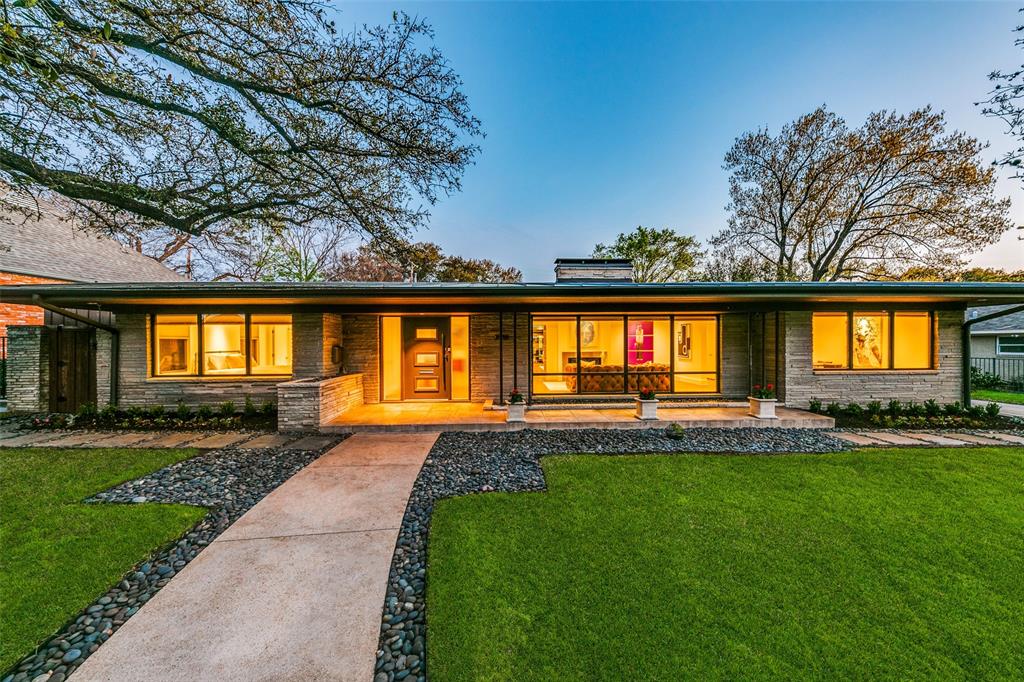 Step inside this evocative mid century modern architectural delight and experience the sleek, sexy cutting edge design of 3918 Fairfax Ave. Discover three spacious bedrooms, each with ensuite baths, walk-in closets and generous living rooms. The chef's kitchen boasts custom cabinetry, a large island with barstool seating, sub-zero refrigerator, and Wolf appliances-double ovens, microwave, and a gas cooktop. Walls of floor to ceiling windows fill the home with natural light, while a separate artist studio offers a tranquil retreat. Outside, a picturesque backyard awaits with shades of a Slim Aarons Palm Springs Pool Party. The main living area features light and airy walls of windows and a decorative fireplace. The primary boasts pool views, private backyard access, a luxurious bathroom with custom closet and cabinetry, oversized custom tub, and separate shower. Live a life to it's fullest and experience California Dreaming in Dallas, TX. Schedule a showing before it's too late.