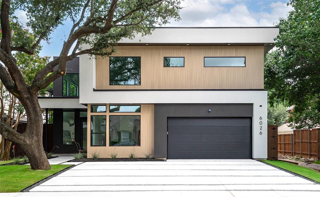 Sensational Modern home in Wilshire Park by acclaimed builder Avant Group, now available in coveted Mockingbird Elementary attendance zone. This North facing, 5 bed, 5.1 bath home features bold modern designs and unmatched quality throughout. Starting with real concrete stucco and zero-maintenance NewTech Wood siding, followed by the soaring 20ft ceiling foyer with loads of natural light, a jaw-dropping Kitchen anchored by a 10ft island adorned in Black Diamond Leathered Quartzite and surrounded by floor-to-ceiling custom wood cabinetry, GE® Cafe® 48in built-in refrigerator & 6-burner dual fuel range and a spacious walk-in pantry. The open-concept flows directly into the dining area & the living room with sliding door leads to the backyard. Make the corner to find the bold powder bath with door to leading to the patio, perfect for your (future) pool bath. The lower level also features a Statement Piece Game Room or Study, with wet bar, glass shelves, wine fridge and bedroom with full ensuite bath. Make your way upstairs to find the Primary Sanctuary Suite, featuring a balcony and massive Spa-inspired Open Style Wet Room with Vessel Tub and shower with Rainfall and 2 wall shower heads. You will need to hit Northpark and update your wardrobe, because this primary closet is massive (15ft x 16ft), and connects directly to the large laundry room, for a simplified lifestyle. Upstairs also has 3 bedrooms with ensuite bathrooms perfect for keeping the littles close by. Includes Control4 Smart Home system, smart lighting & pre-wired for CAT-6E, speakers & cameras. Designed for efficiency and durability, the home features a piered-slab foundation, foam insulation & dual tankless water heaters. For added peace of mind, the home includes the Maverick(r) 1-2-10 Builders Warranty. This Avant Group masterpiece perfectly blends style, modern amenities, & functionality, making it an ideal choice for luxury living in heart of Dallas