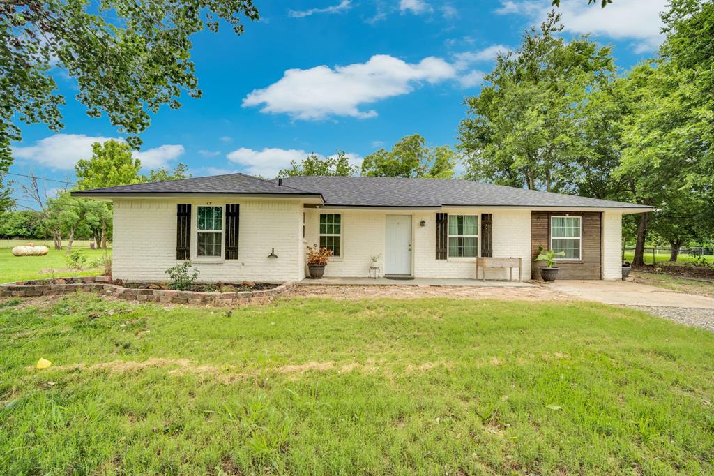 The search is over: you truly can have the peace of country acreage without giving up the convenience of the city. This charming home features 3 comfortable bedrooms, 2 full bathrooms, plus a media room that could easily serve as a 4th bedroom. Step out back to enjoy the endless possibilities of your massive acre lot, featuring ready-to-use garden beds and a large storage shed perfect for lawn equipment, tools, or hobbies. Best of all, you get the quiet, wide-open feel of country living while being less than 15 minutes away from the vibrant shops, dining, and charm of downtown Waxahachie. Truly a turnkey gem — schedule your showing today!