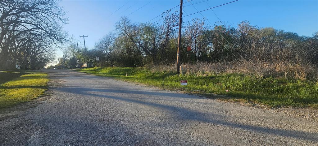 Discover an excellent opportunity to build in an established area just minutes from downtown Waxahachie. This vacant lot offers a prime infill location with convenient access to local dining, shopping, and community amenities, while still maintaining a neighborhood feel.

City water is available at the street; however, no current service is connected to the lot. Sewer service is not currently on site, and per city guidance, an extension of approximately 200 feet to the main line at the intersection of E Jefferson and Oneida will be required. Buyers should plan for engineering, permitting, and connection costs associated with development.

Located within an Opportunity Zone, this property presents strong potential for investors or builders seeking long-term value and growth. With ongoing development in the surrounding area, this lot offers flexibility for those looking to build a primary residence or investment property.

Buyer and buyer’s agent to verify all information, including utility availability, zoning, easements, setbacks, and building requirements.