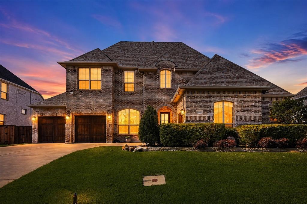 Nestled within the highly sought-after Canyon Falls community and zoned to the acclaimed Argyle ISD, this stunning Drees Homes residence delivers an exceptional standard of living from the moment you arrive. A grand foyer sets the tone, showcasing a breathtaking spiral staircase and rich wood flooring that flows throughout the main living areas. Thoughtfully designed  the open-concept layout seamlessly connects the main living room anchored by a painted fireplace with pool views  the chef's kitchen, and the dining area.The kitchen is a true centerpiece, appointed with a large island, granite countertops, abundant premium cabinetry, a built-in desk area, and a spacious walk-in pantry. The dining space comfortably accommodates an oversized table, making it ideal for gatherings of any size. Privately positioned near the entry, the dedicated study offers a quiet and refined workspace. Just off the main living areas, a secondary bedroom and full bath provide excellent flexibility for guests or multigenerational living.Tucked at the rear of the home, the primary suite is a peaceful sanctuary featuring a spa-inspired bath with a soaking tub, walk-in shower, and a custom Elfa-appointed closet with direct access to the laundry room complete with a sink. The kitchen pantry and primary closet also feature the same custom Elfa shelving system. Upstairs, the home continues to impress with a spacious game room, media room, and two additional bedrooms with two full baths accessible from both the room and the hallway a versatile layout designed. Step outside to a backyard crafted for relaxation and year-round enjoyment. Perfectly oriented to the outdoor living space features a pool and spa, a covered patio, pergola, and a private putting green an entertainer's dream. Canyon Falls delivers a resort-inspired lifestyle with two pools, a clubhouse, fitness center, splash pad, playgrounds, a dog park, miles of scenic trails, and HOA-included front yard maintenance, and internet service.