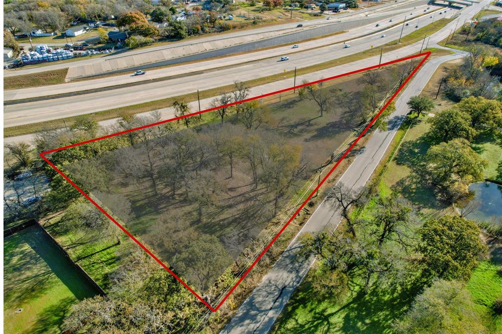 Comercial Acreage in Prime Location With Excellent Frontage off of Hwy 199! Spacious land with outstanding visibility with frontage on both SE Parkway and Scotland Ave. The sale includes two adjoining lots—1716 and 1724 SE Parkway—providing generous space for future development. Utilities are available, including electricity and city water-sewer, making it a strong candidate for your next business venture. This versatile site is well-positioned for a wide range of uses. Bring your vision and build in one of the area’s fastest-growing locations!