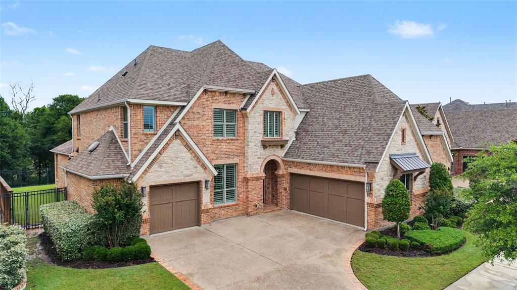 Welcome home to this stunning Bracken III floorplan in the highly sought-after Viridian community of Arlington on prestigious Blue Lake Blvd! Built in 2015 and situated on a private 75' lot backing to a serene landscape of privacy, this beautifully designed 5-bedroom, 4-bath Drees home offers 4,358 square feet of exceptional living space with the perfect blend of elegance, comfort and functionality. Located in Viridian Village and just minutes from lakes, trails, tennis, sailing, dining and DFW airport, the community is known for its resort-style amenities and natural beauty. 

Inside, you'll find handscraped hardwood floors, plantation shutters throughout, extensive lighting, a private study, and a convenient pocket office ideal for working from home. The spacious kitchen features beautiful knotty alder cabinetry, pot drawers, a Butler's pantry, and opens seamlessly to the breakfast room and expansive living areas designed for entertaining. With 2 living areas, a media room, formal dining and a breakfast dining space, this home provides flexibility for everyday living and hosting guests. 

The oversized 3-car garage includes both an extended double car garage and an extended single car garage, offering abundant storage and workspace. The outdoor living area is equally impressive with a large covered patio with outdoor brick fireplace, gas line for grilling, and a private backyard setting surrounded by mature trees. Additional features include a tankless water heater, utility sink in the laundry room, and thoughtful architectural details throughout. 

This exceptional Viridian home combines a true pride of ownership, luxury finishes, generous space, and an unbeatable location in one of Arlington's premier master-planned communities.